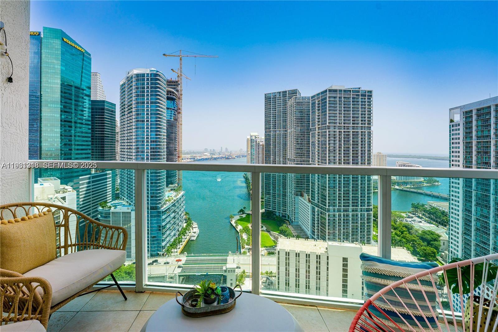 Located on the 37th floor, this spacious two-bedroom, two-and-a-half-bath residence offers river and city views. Marble flooring is featured in the main living areas, with wood flooring in the bedrooms. The primary suite includes an oversized walk-in closet and a private terrace. Brickell on the River is a full-service condominium with five floors of amenities, including two pools. The property is situated across from Brickell City Centre and within close proximity to dining, shopping, and entertainment options in Brickell.