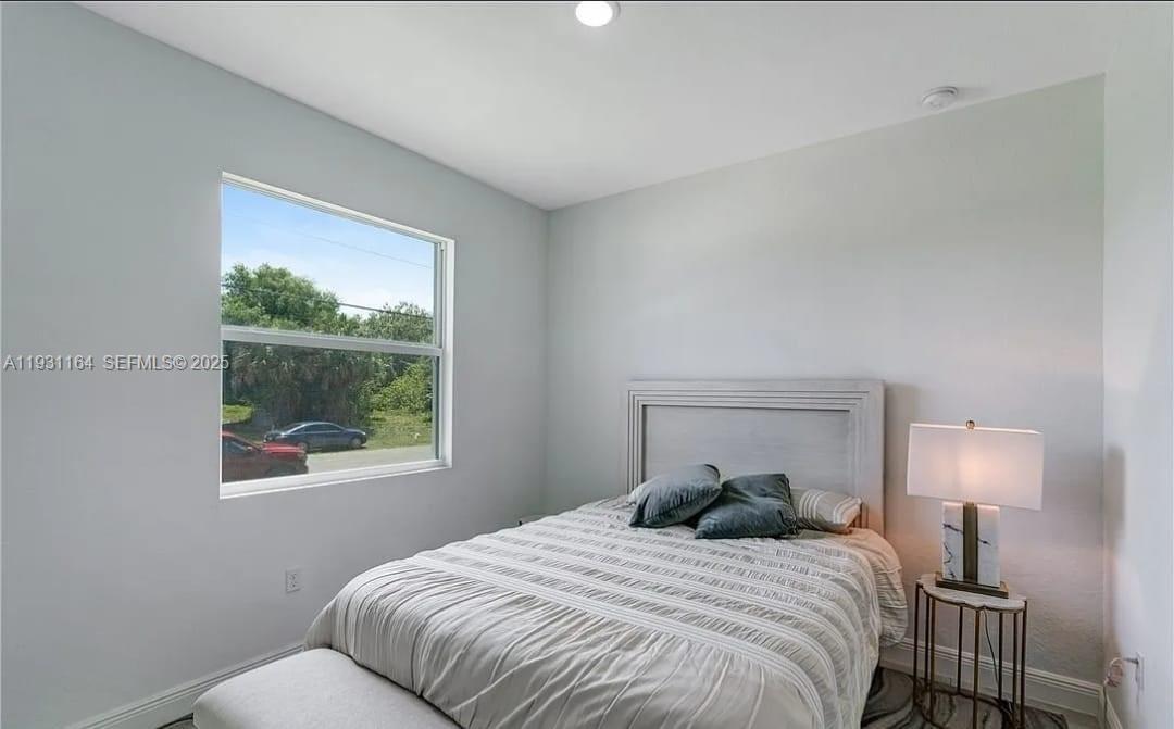 Well-appointed guest bedroom at 2008 HERCULES - Home in La Belle
