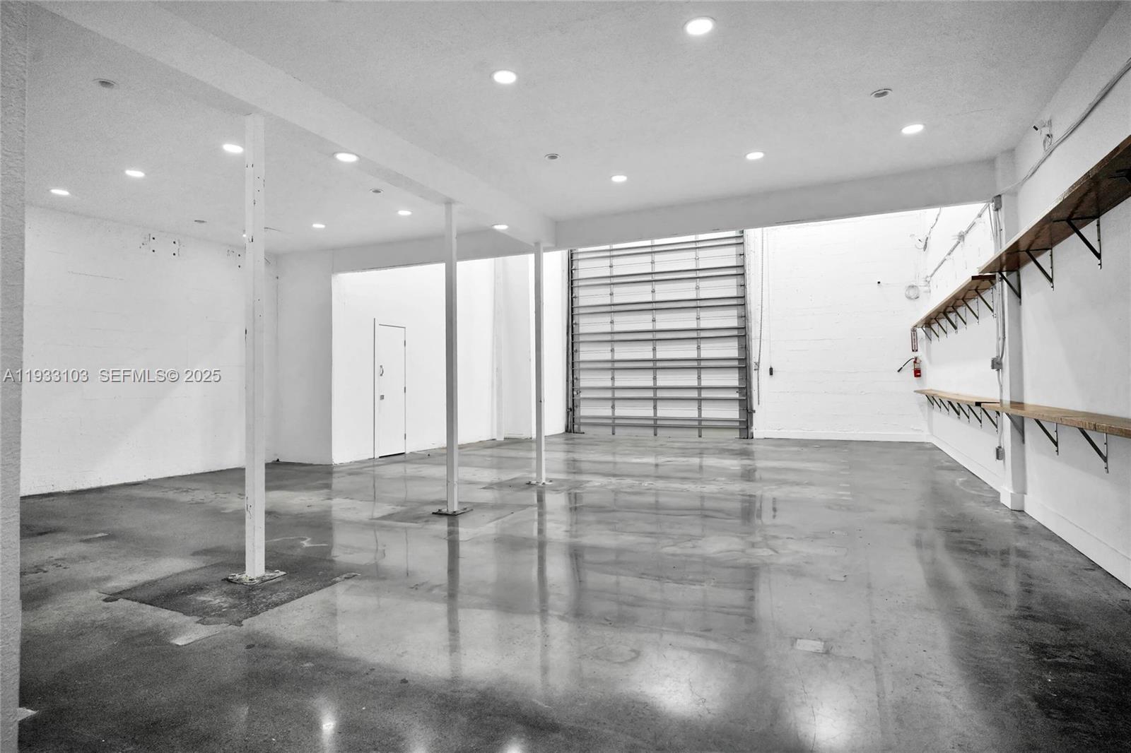 This ±3,398 Sq.Ft. warehouse/office space in prime Doral offers a versatile layout with modern upgrades. The warehouse area is ±1,150 Sq.Ft. (33.84%) and features 9’ and 20’ ceiling heights, an electric & insulated roll-up bay door (10' x 12’), and LED lighting. The office space is ±2,248 Sq.Ft. (66.16%) across two floors. The first floor includes a reception area, storage room, and a bathroom, while the second floor features two offices, an IT room, a renovated kitchenette, an open workspace, and another bathroom.