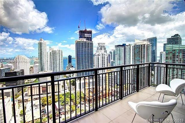 Beautifully furnished penthouse with water view and large balcony. Come to see this unit with spacious balcony and open floor plan. Washer and dryer at the unit. Modern layout. Amazing location on top of Publix and Mary Brickell Village. Two parking spaces. Easy to show.