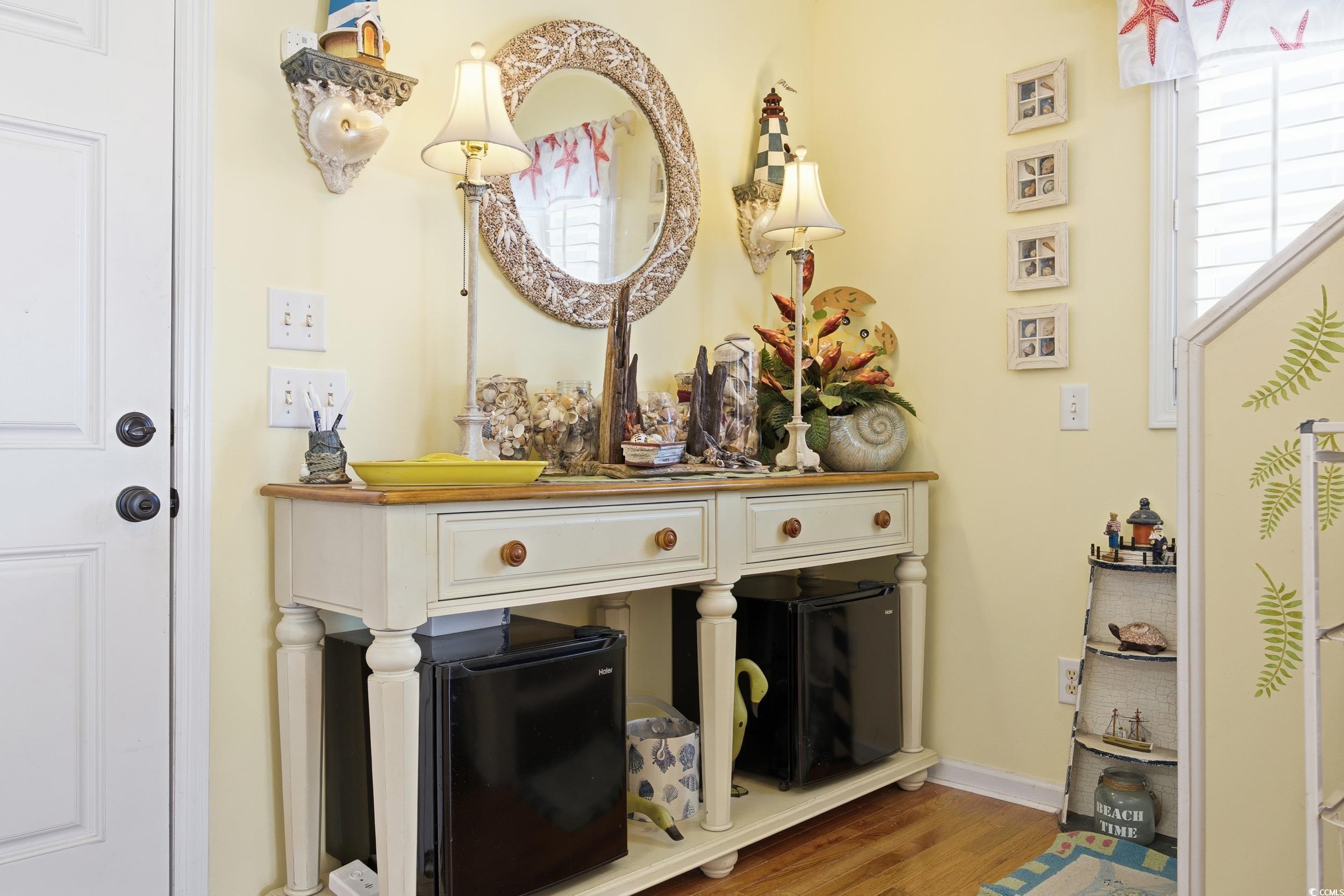 Detailed view of wood finished floors and baseboards