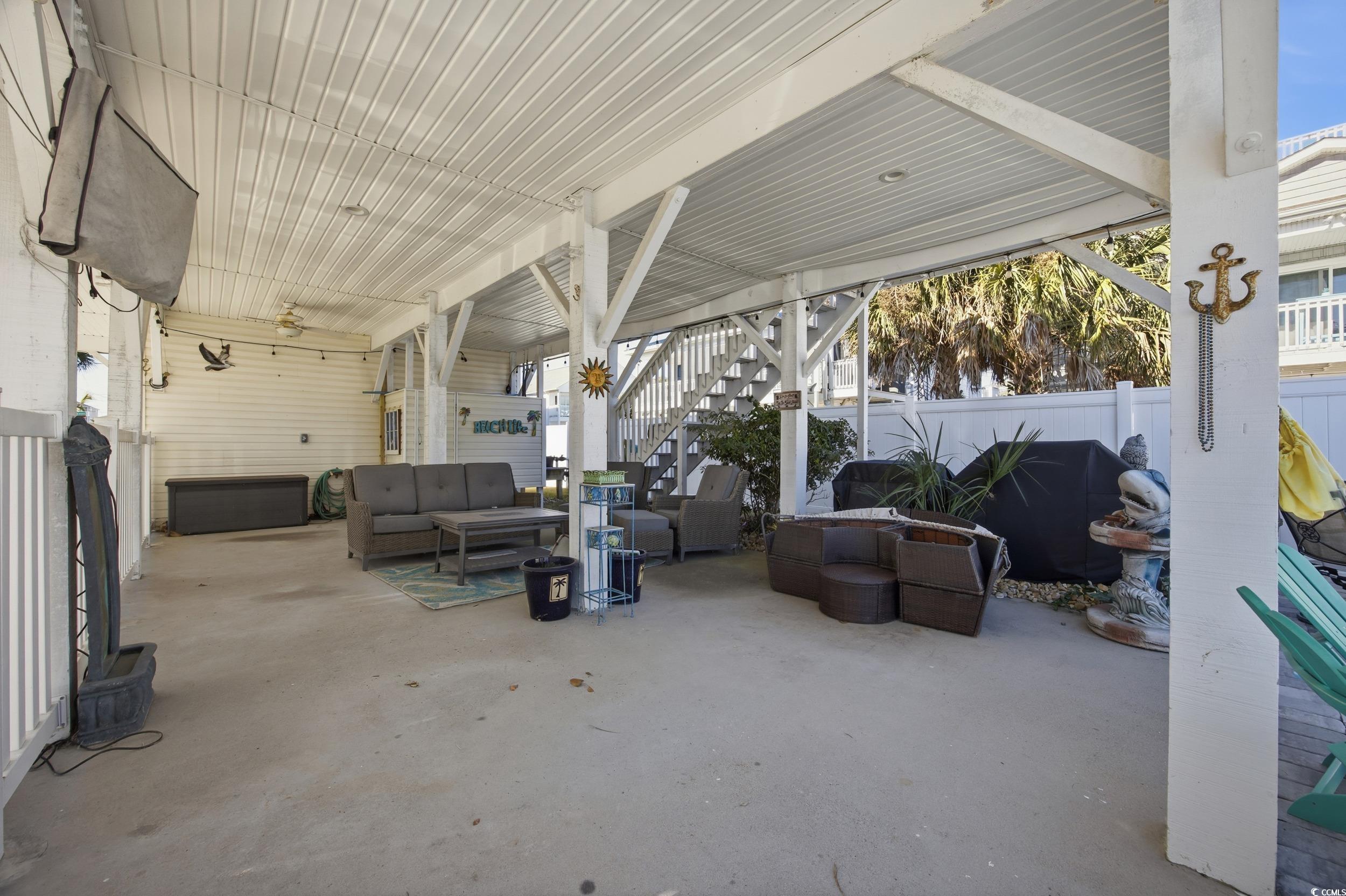 View of patio / terrace with an outdoor living space and stairway