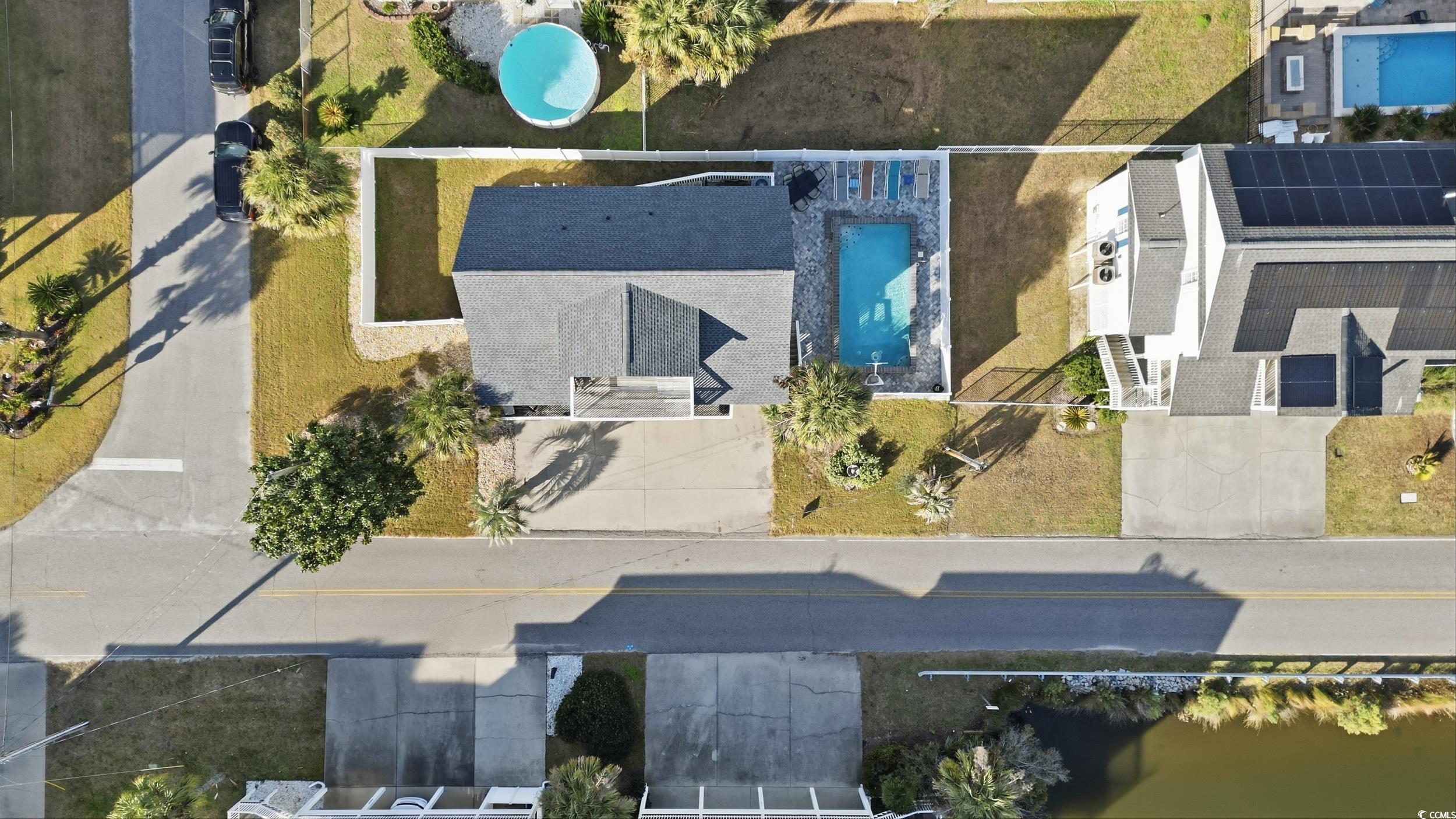 View from above of property with a pool