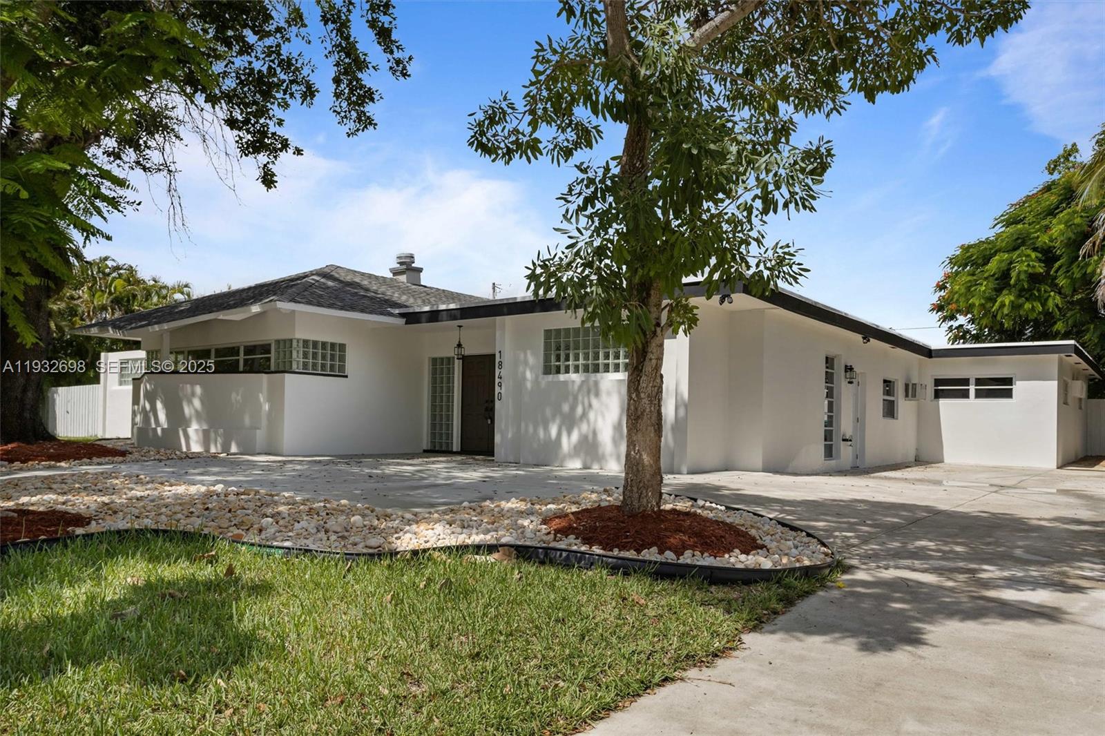 Discover this beautifully updated 5-bedroom, 3.5-bathroom home in the sought-after neighborhood of Cutler Bay, just off Old Cutler Road. Situated on a spacious 15,000 sq. ft. lot, this property offers comfort & modern amenities. The newly renovated kitchen features brand-new appliances and elegant countertops, perfect for home chefs. Soaring vaulted ceilings enhance the open living areas, creating a bright and airy feel. The master suite includes an en-suite bathroom, and four additional bedrooms provide ample space for family and guests. Large studio-like converted double garage can be a den, man-cave, workshop, or music room. Large backyard, with room for pool, is perfect for outdoor activities & relaxation. Combining modern updates with timeless charm, this home is ideal for families.