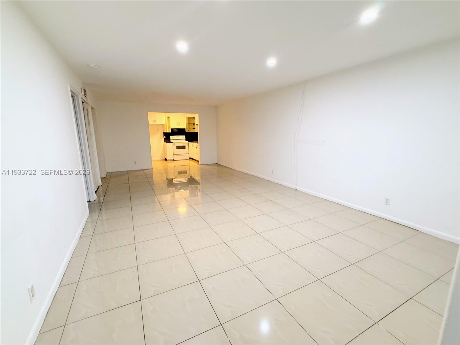 Open-concept living area at 2950 Griffin Rd - Home in Dania Beach
