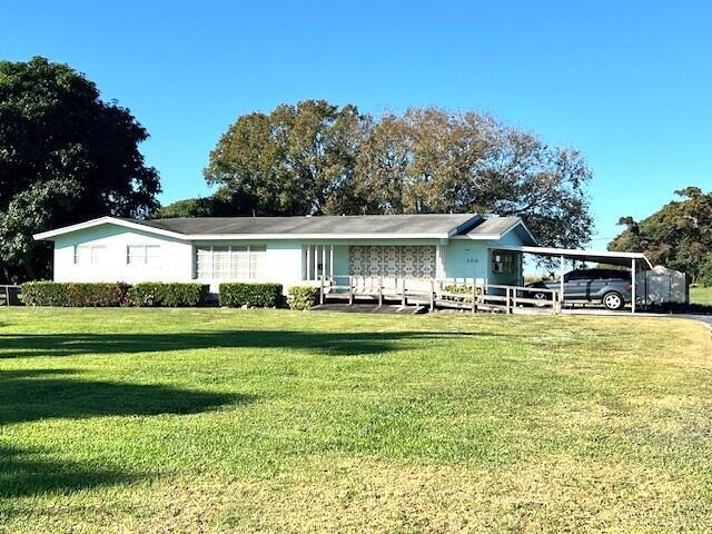 Homes for sale in Belle Glade, FL | 100 Royal Palm Way, Belle Glade, FL 33430 | MLS# R11149008