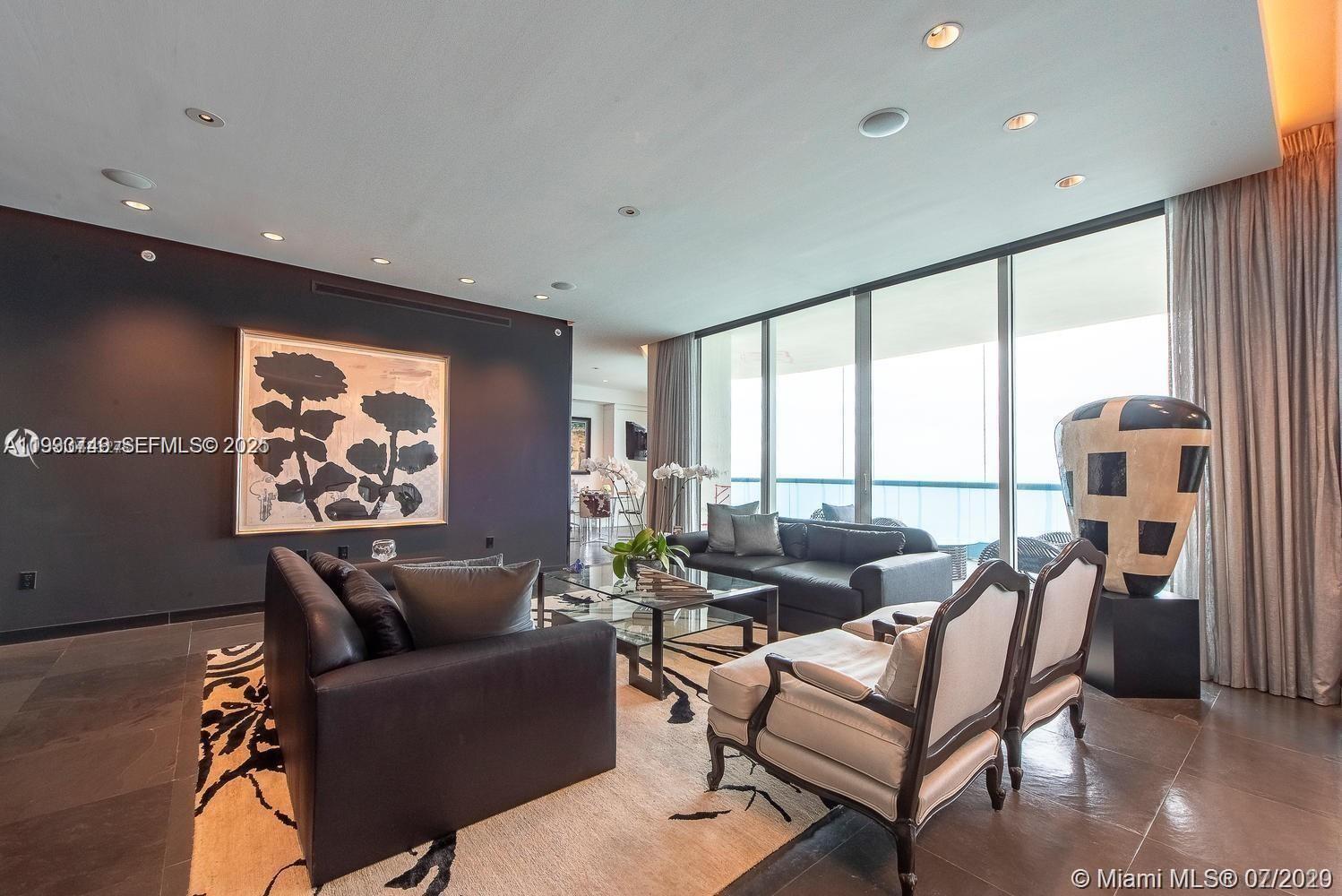 Luxury oceanfront residence at Turnberry Ocean Colony, Unit 1503, featuring breathtaking direct ocean and Intracoastal views from every room. This home approximately 3,500-square-foot home offers 3 bedrooms, 4.5 baths, and a private elevator entry. Residents enjoy world-class, five-star amenities including two heated pools, a full-service spa, private beach service, state-of-the-art fitness center, children’s club, hair salon, and two on-site restaurants with room service, along with 24-hour concierge, valet parking, gated entry, and dog-walk areas.