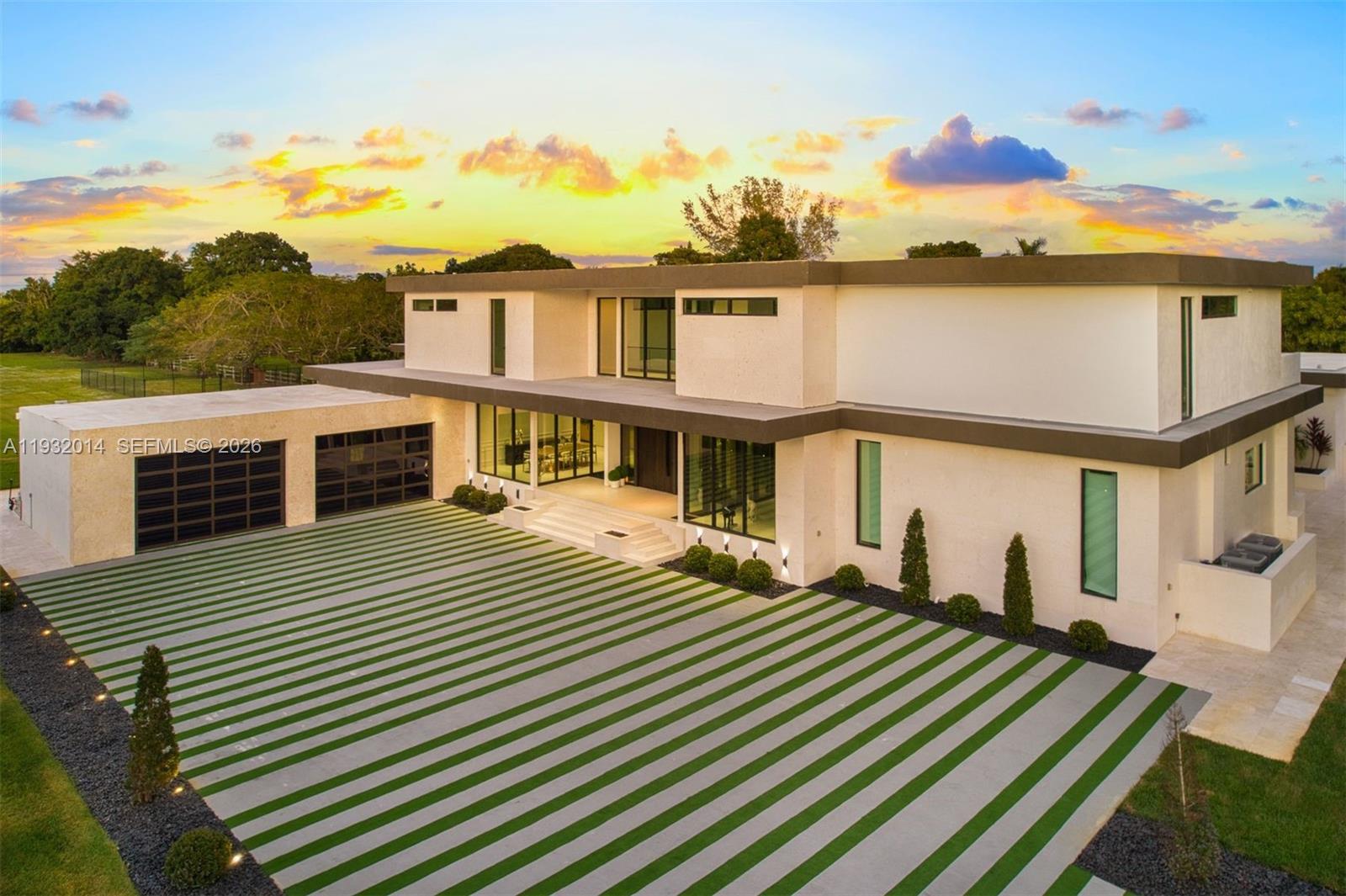 Modern kitchen with designer features at 17841 70th Pl - Luxury Estate in Southwest Ranches