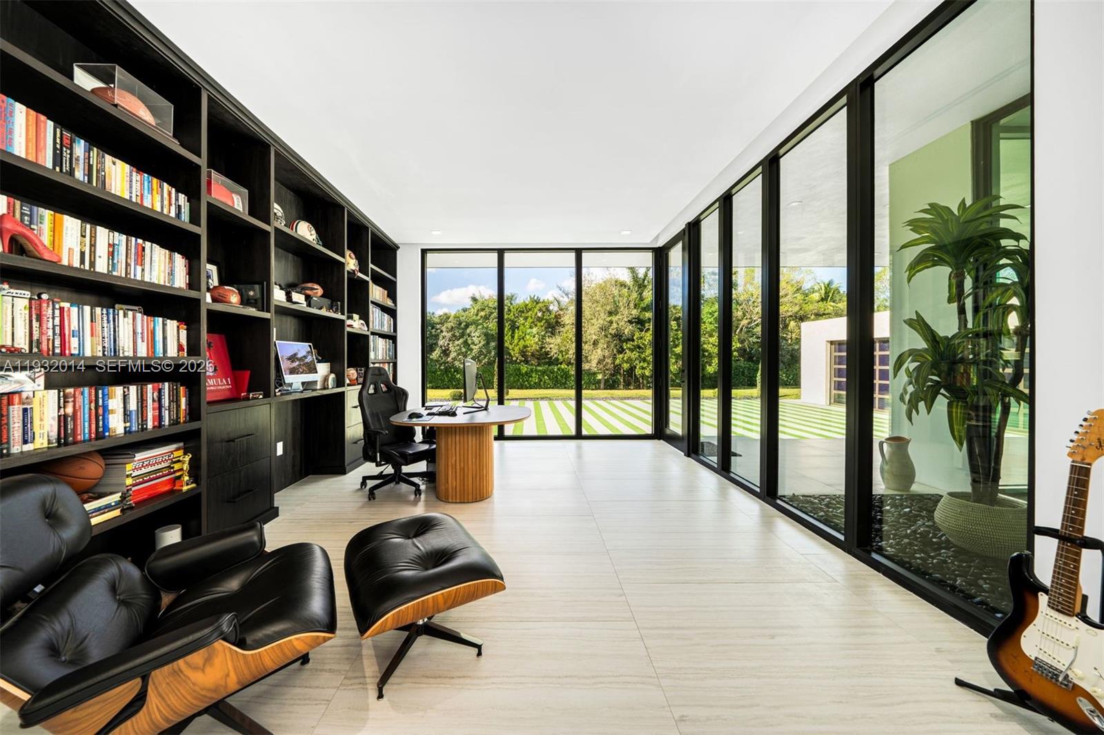 Modern kitchen with designer features at 17841 70th Pl - Luxury Estate in Southwest Ranches