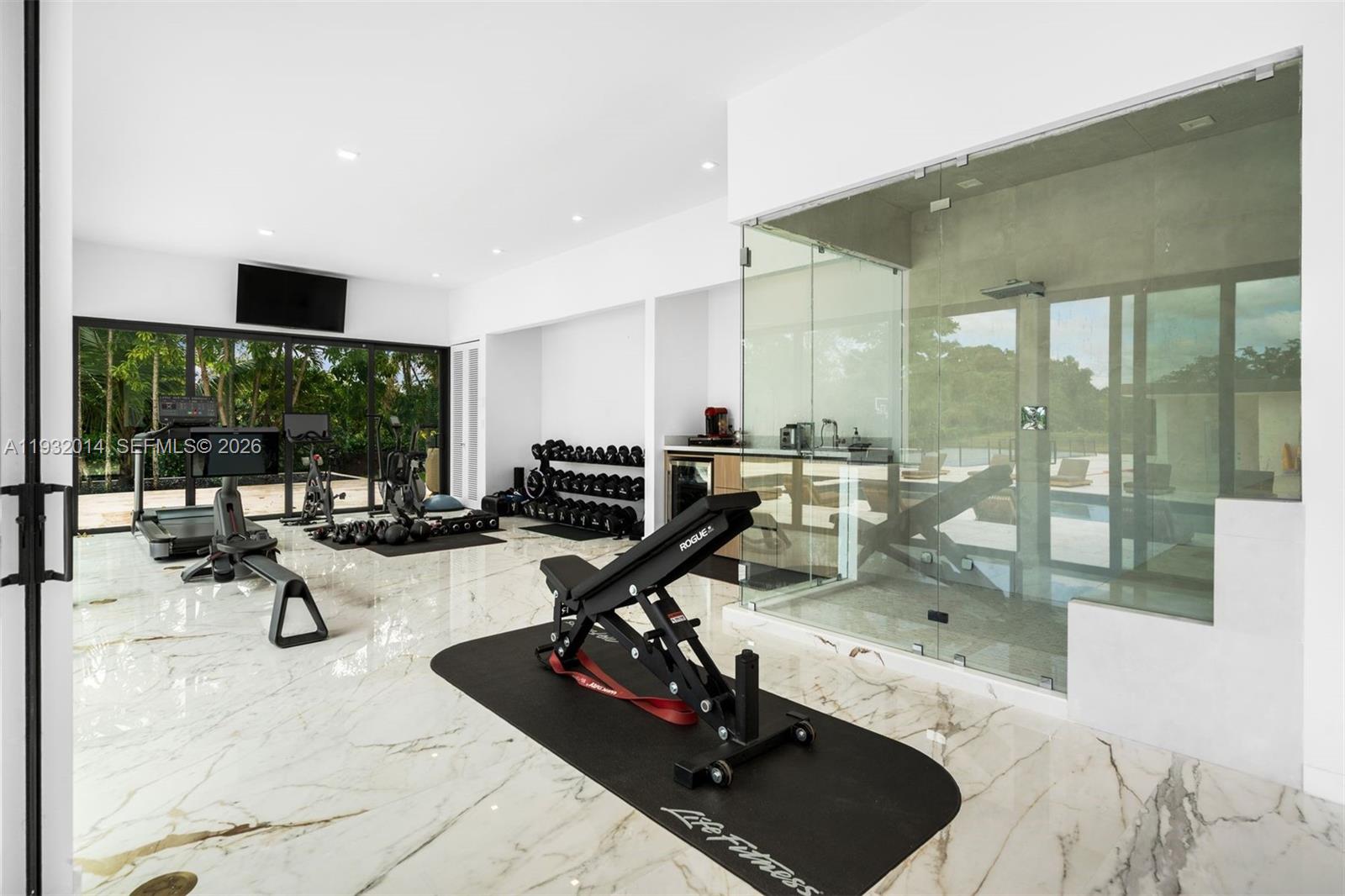 Open-concept living area at 17841 70th Pl - Luxury Estate in Southwest Ranches