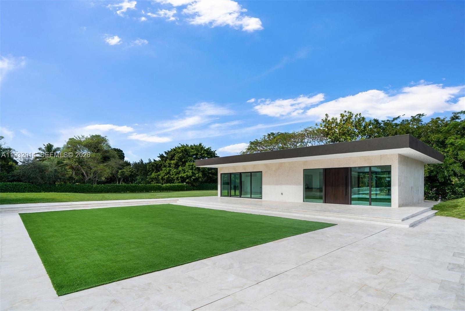 Modern kitchen with designer features at 17841 70th Pl - Luxury Estate in Southwest Ranches