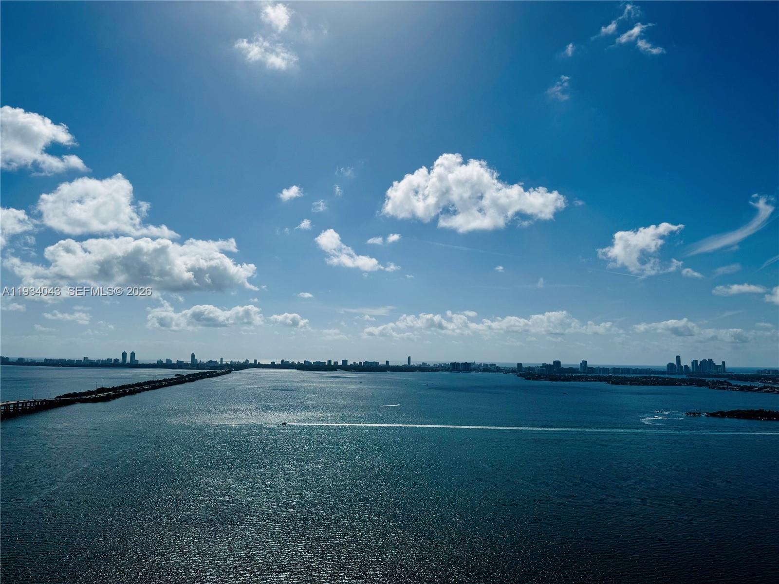 Experience the epitome of luxury living on the 34th floor of this stunning 2-bedroom, 3-bathroom residence in the prestigious Gran Paraiso. This spacious unit boasts breathtaking, unobstructed water views, offering serene vistas from every room. Enjoy sleek, modern finishes, floor-to-ceiling windows, and an open floor plan perfect for entertaining. The building's world-class amenities include a spa, tennis, bowling, golf simulator, pool table, gym and resort-style pool. You'll also have a reserved parking space for added convenience. Located just steps from the renowned Amara at Paraiso restaurant, where you can indulge in exquisite cuisine, this is a lifestyle opportunity you don’t want to miss! Unit 3405 is also for sale, schedule your showing today!