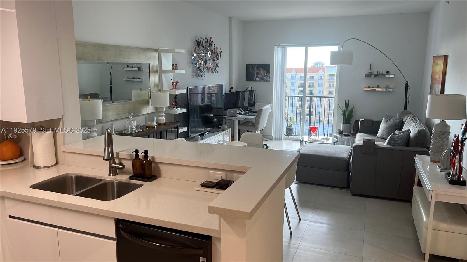 One Bedroom/One Bath condo in the highly sought-after Ten Aragon building in the heart of Coral Gables. The unit faces the pool deck. One of the most desirable exposures in the building, offering a tranquil view. Completely remodeled and new appliances.  Porcelain flooring throughout. Move-in ready.  TWO ASSIGNED PARKING SPACES. Enjoy living just steps from Miracle Mile and the vibrant Giralda Plaza pedestrian walkway, surrounded by fine dining, cafés, shops, art galleries, bookstores, & theaters. Conveniently located near UM, Coconut Grove, Brickell, Downtown Miami, and the Beaches. The building offers 24-hr security & concierge service, heated pool, jacuzzi, fitness center, and business center.