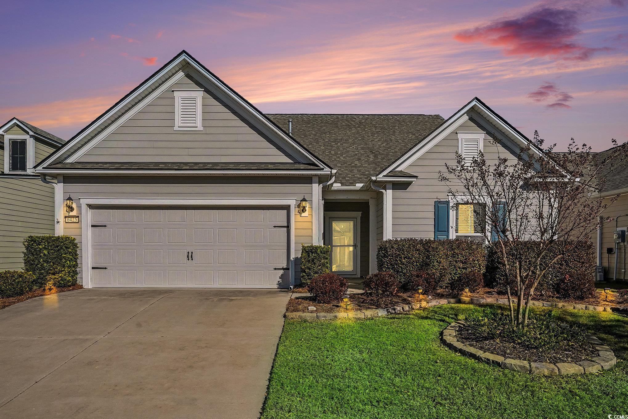 Motivated seller. Welcome to this expansive 4-bedroom, 3-bathroom residence nestled on a beautifully landscaped lot with a serene water view in Del Webb. This "like-new" home boasts an array of custom features, including a spacious 27 x 22-foot loft, a bedroom with an en-suite bath, and a thoughtfully designed walk-in attic that provides easy access and ample storage. Enjoy a multi-source amplified audio surround system and a stunning 8-light candle chandelier in the dining area.  The kitchen is a chef's dream, featuring a Sierra tile backsplash, elegant quartz countertops, and a stainless-steel appliance package that includes a 5-burner range, microwave, dishwasher, and refrigerator. The entry, gathering area, kitchen, dining room, and master bedroom are adorned with beautiful two-piece crown molding. The owner's suite offers an oversized walk-in rain shower and a generous closet. Unwind in the air-conditioned Carolina room while taking in the evening views or relax on the attached patio.  Del Webb provides a resort-style amenity center with an outdoor fire pit overlooking the Intracoastal Waterway, an indoor pool, a fully equipped gym, four pickleball courts, two tennis courts, and covered bocce ball courts. There's also a full-time activities director and exclusive access for homeowners to the Grande Dunes Ocean Club! This property is situated in Myrtle Beach's premier coastal community.