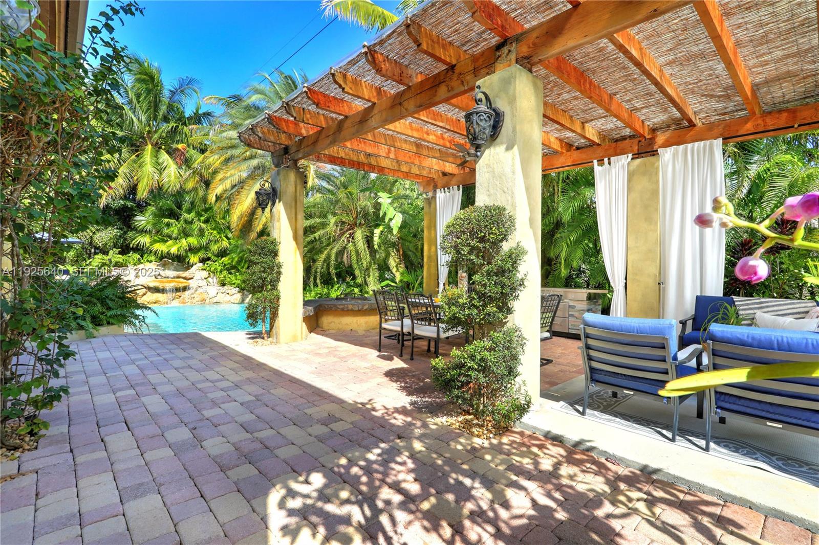 Elegant Family Retreat with Resort-Style Backyard | Furnished or Unfurnished.Welcome to an exceptional private residence designed for comfortable family living and effortless entertaining. Tucked away on a quiet cul-de-sac and surrounded by lush tropical landscaping, this spacious 5-bedroom plus office home offers a rare blend of privacy, elegance, and resort-style amenities.Soaring 14-ft ceilings, expansive open living spaces, a thoughtfully designed floor plan, chef’s kitchen, and a dedicated office/study provide ideal functionality for modern family life.Step outside to your own private resort oasis. The breathtaking backyard features a heated pool and jacuzzi, each with independent temperature controls, framed by cascading waterfalls and tropical greenery. Whether enjoying peaceful mornings, hosting family gatherings, or relaxing in the evenings, this outdoor space is designed to be enjoyed year-round.Additional highlights include impact windows and doors, multiple lounge and entertaining areas, wine cellar, poolside gazebos, BBQ area, and spacious bedrooms offering comfort and privacy.Conveniently located near highly regarded public and private schools including Trinity, Palmer Trinity, Westminster, and Alexander’s Montessori. A rare opportunity to enjoy a serene, high-end lifestyle in a home that feels both luxurious and welcoming. Easy to show. Call today!