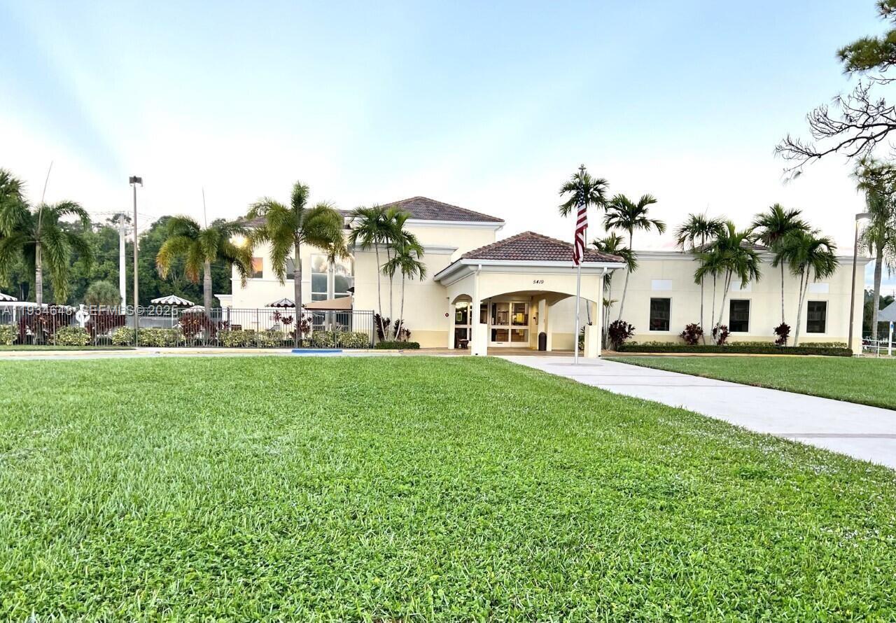 Modern kitchen with designer features at 243 Sheffield J - Condo in West Palm Beach