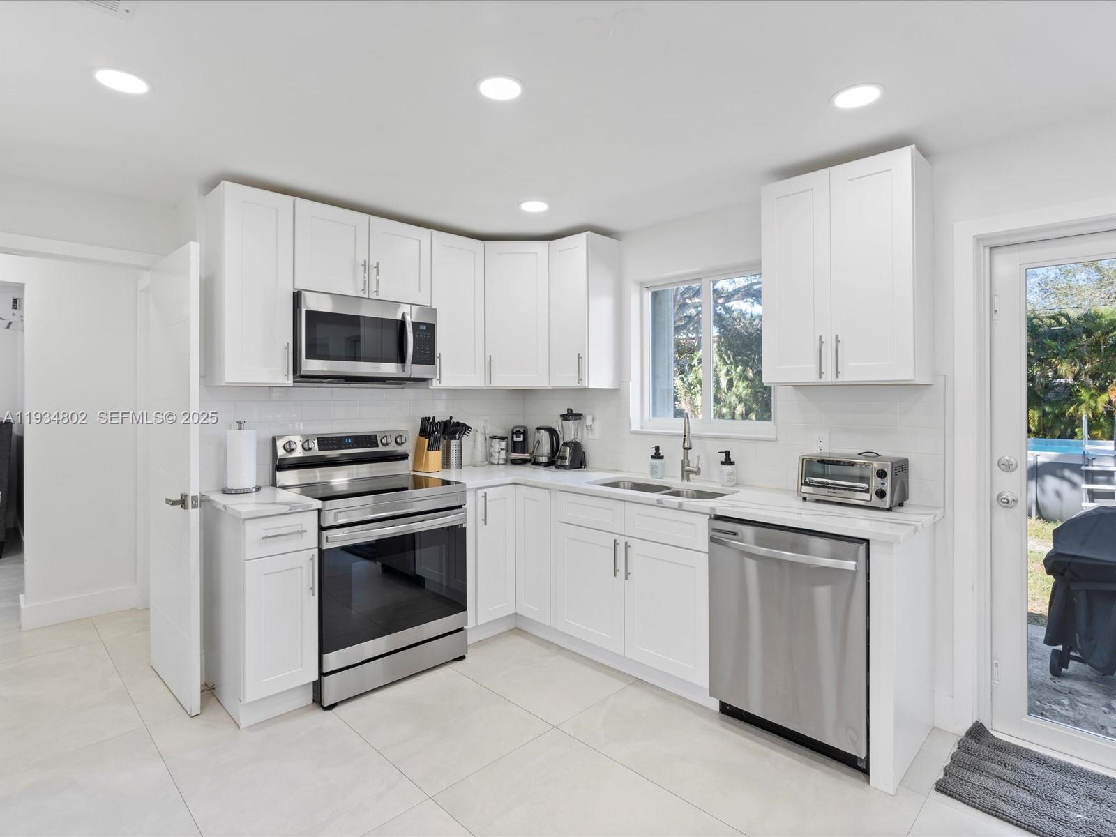 Elegant master bedroom retreat at 4121 54th Ct - Home in Dania Beach