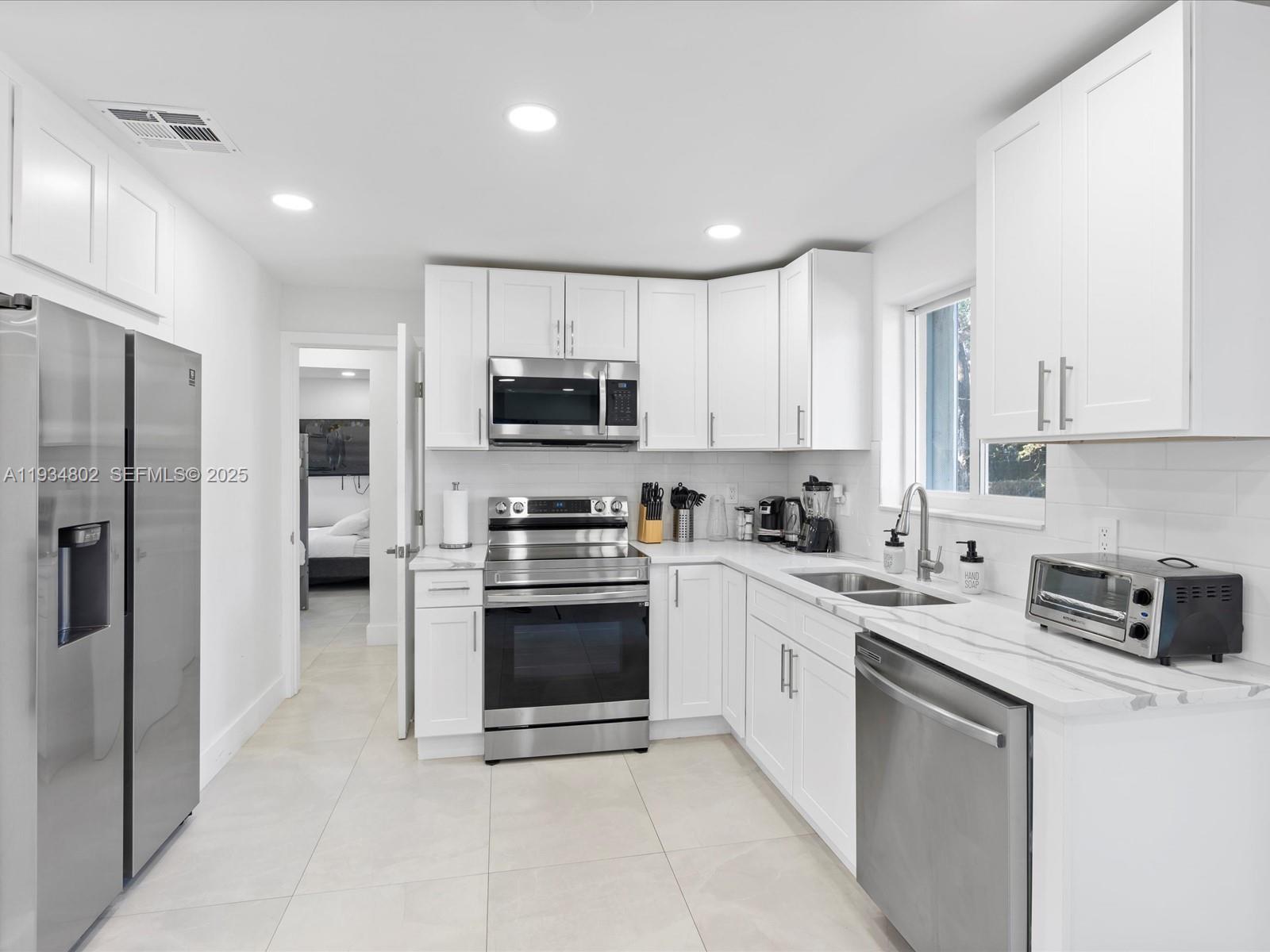 Designer master bathroom at 4121 54th Ct - Home in Dania Beach