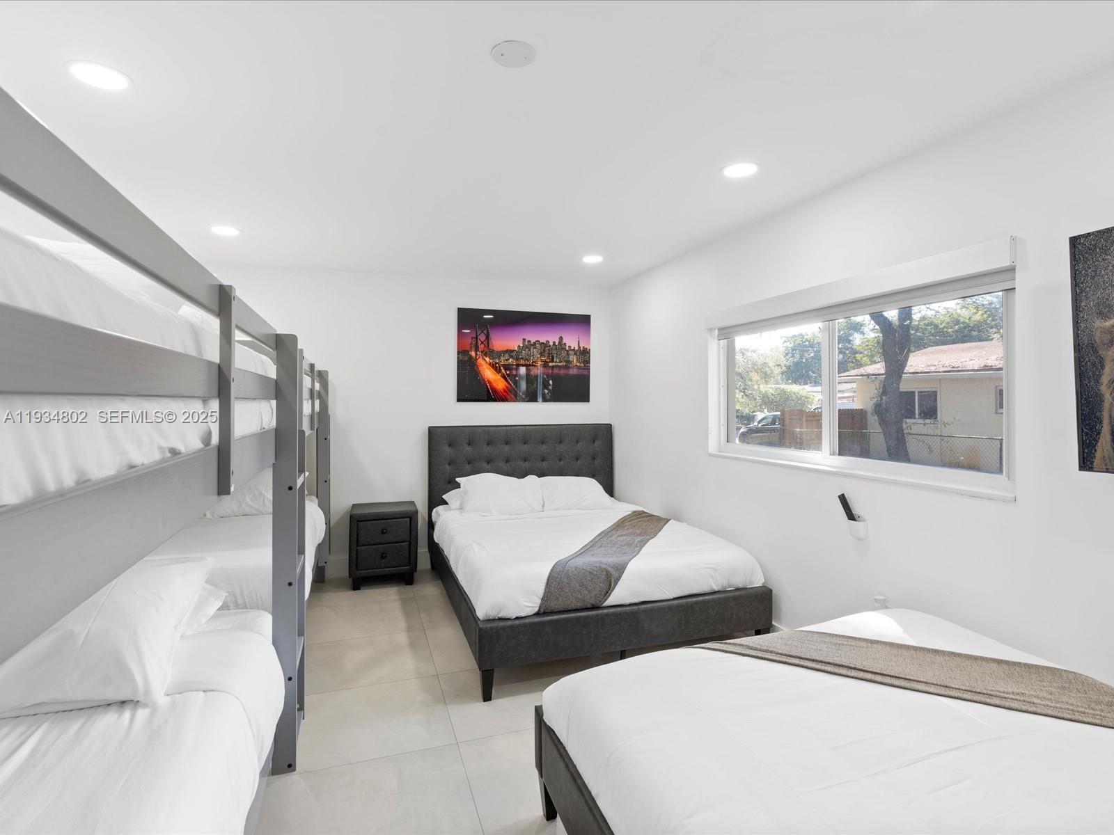 Well-appointed guest bedroom at 4121 54th Ct - Home in Dania Beach