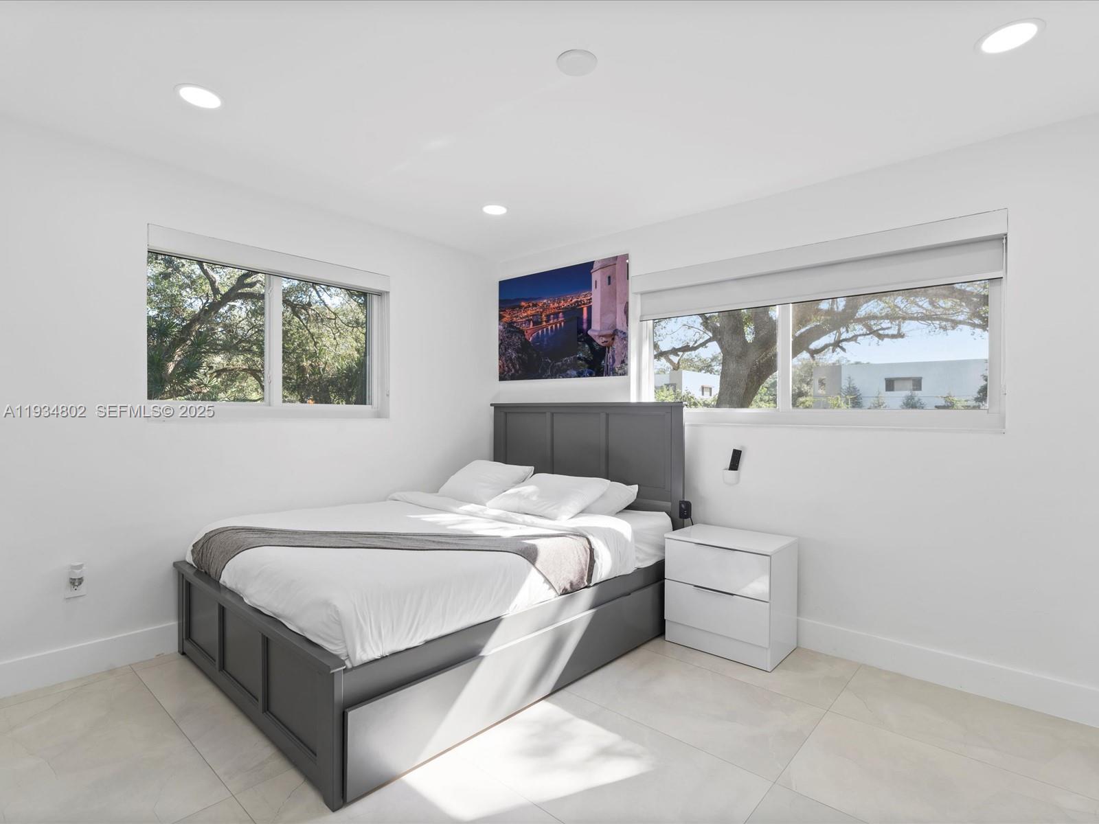 Elegant master bedroom retreat at 4121 54th Ct - Home in Dania Beach
