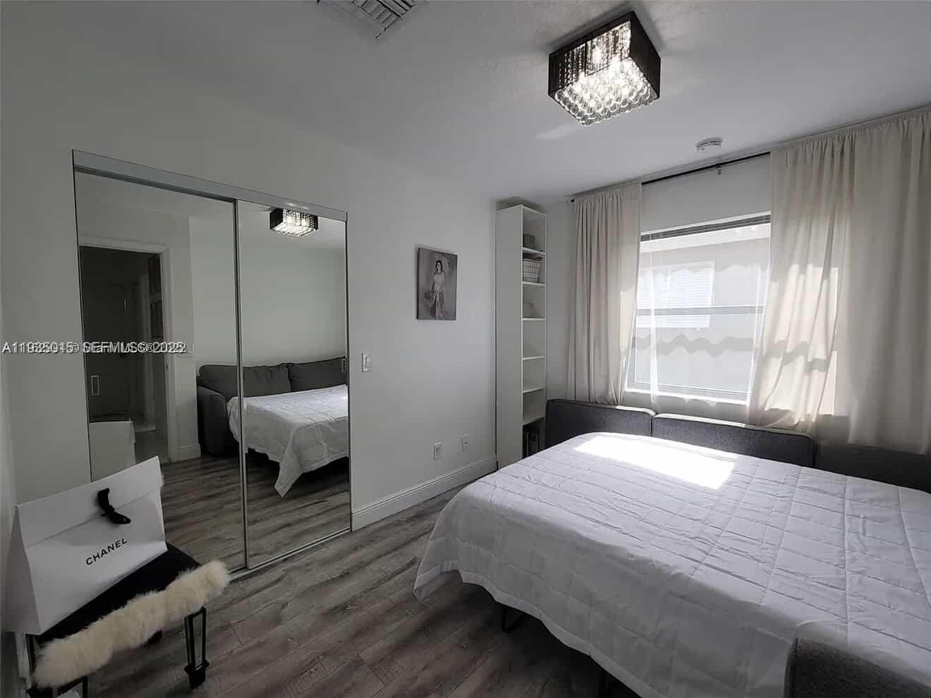 Elegant master bedroom retreat at 270 7th St - Home in Dania Beach