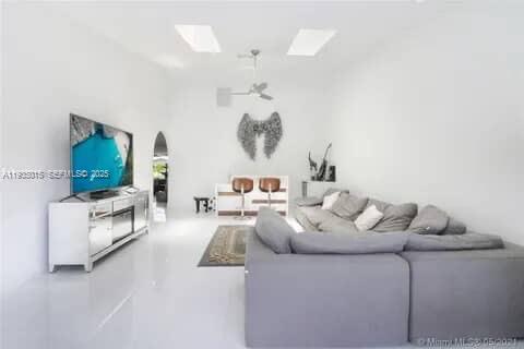 Open-concept living area at 270 7th St - Home in Dania Beach