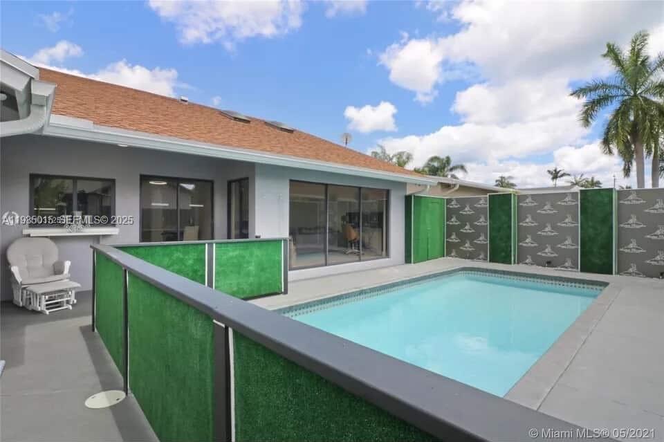 Modern kitchen with designer features at 270 7th St - Home in Dania Beach