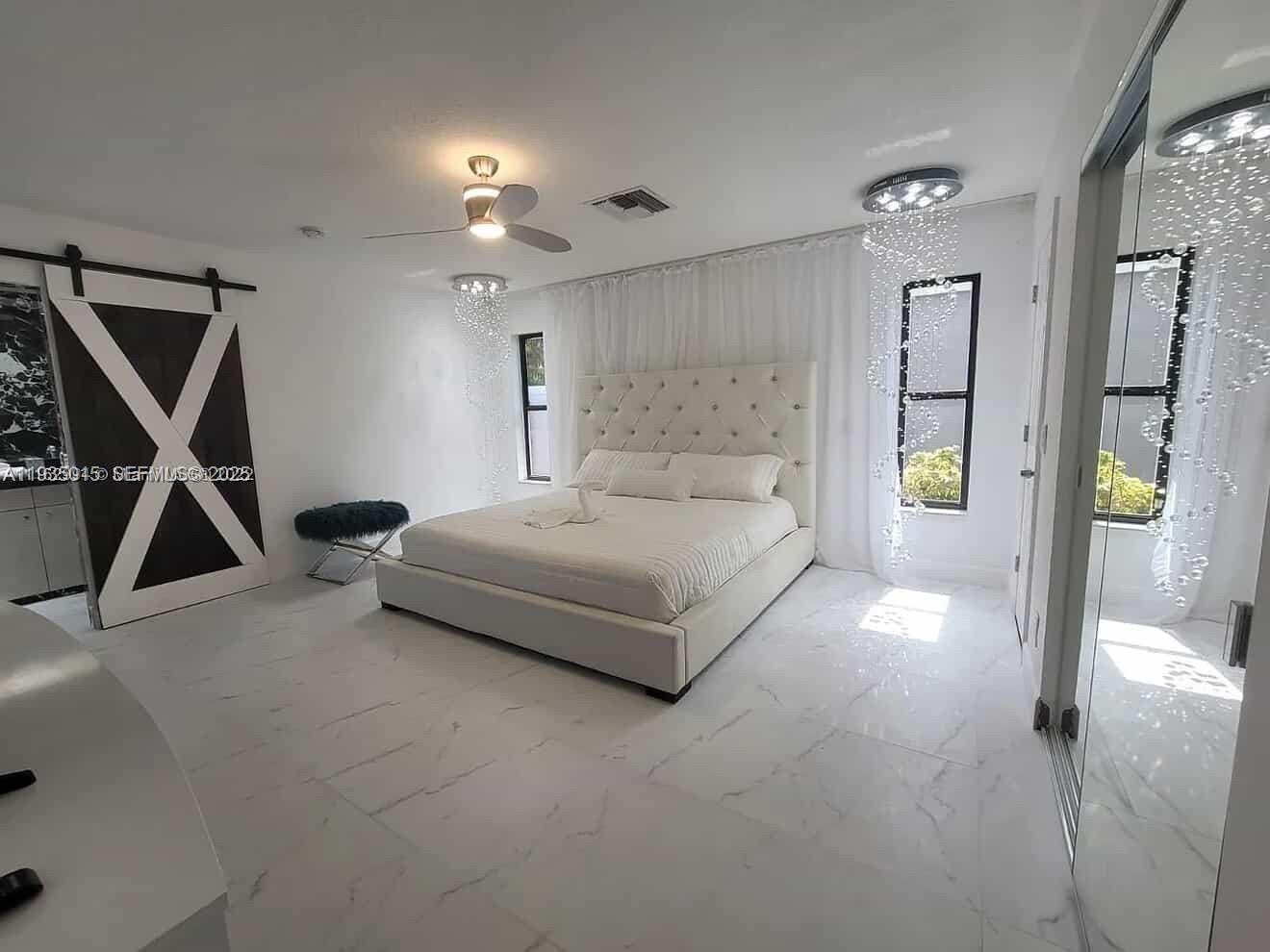 Elegant master bedroom retreat at 270 7th St - Home in Dania Beach