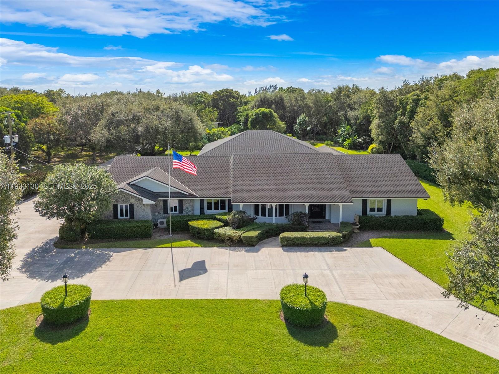 North Homestead masterpiece! The property was 100% renovated in 2019 with no expense spared or detail missed. The lush landscaping and natural forest preserve make for unique 3.98 acre estate located in north Homestead.