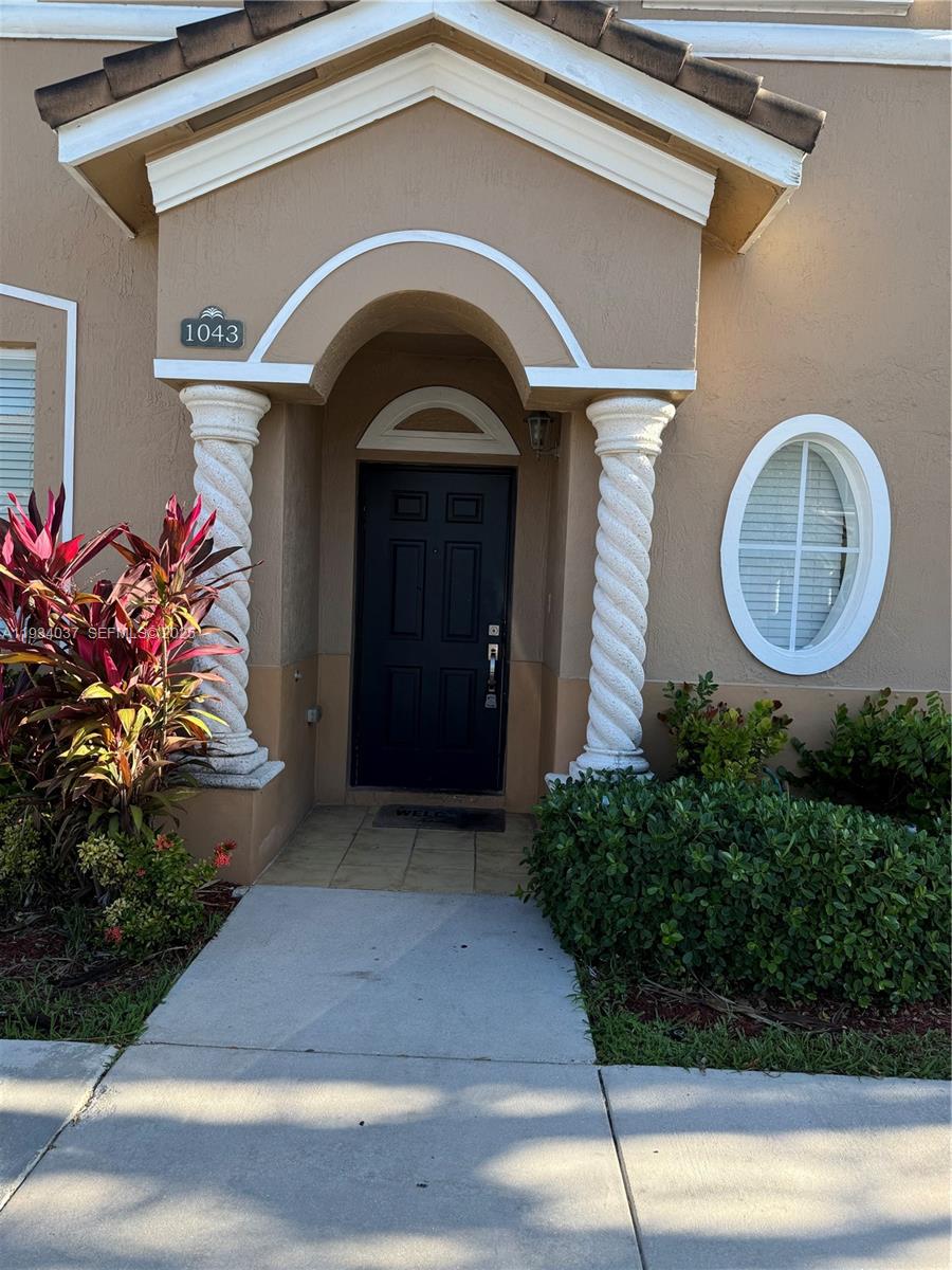 Discover the perfect blend of comfort and convenience in this inviting 4-bed, 3-bath townhouse in the desirable gated community Seascape! Spacious layout, modern kitchen, and private patio. Close to schools, shops, and conveniently located  minute from the Florida Turnpike. Perfect for families or professionals!"Don't miss this must-see opportunity!!Call listing agent for details.