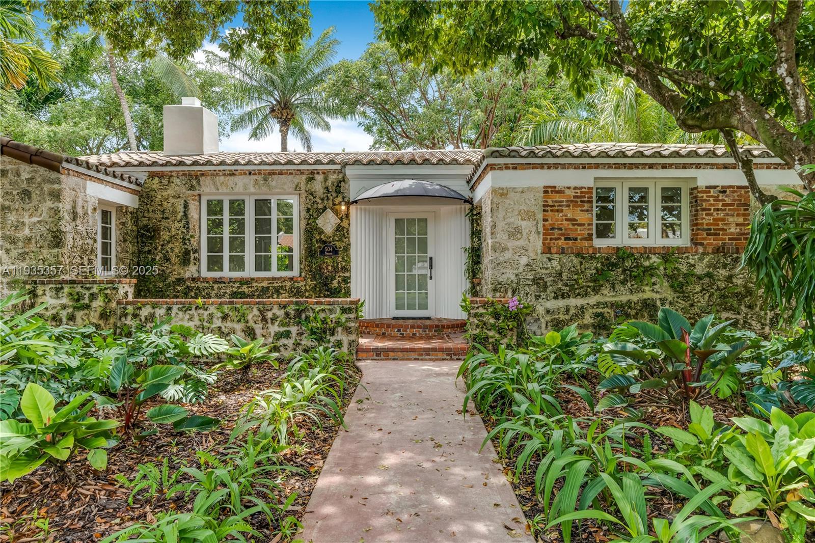 Step into timeless elegance with this exquisitely restored 3-bedroom, 2-bath historic residence in the heart of Coral Gables. A rare architectural gem, this home seamlessly blends classic charm with refined modern updates.From the moment you arrive, you’ll be captivated by the lush, expansive grounds, framed by majestic mature trees that create a private, serene oasis. Inside, every detail has been thoughtfully curated to honor the home’s heritage while delivering contemporary comfort.An air-conditioned garage provides versatile space—perfect for a private office, studio, or additional climate-controlled storage. Ideally located just steps from downtown Coral Gables, premier dining, luxury hotels, and picturesque parks, this residence offers an unmatched lifestyle of convenience and sophistication.Vacant and easy to show—this is a truly exceptional opportunity to live in one of Coral Gables’ most coveted historic homes.