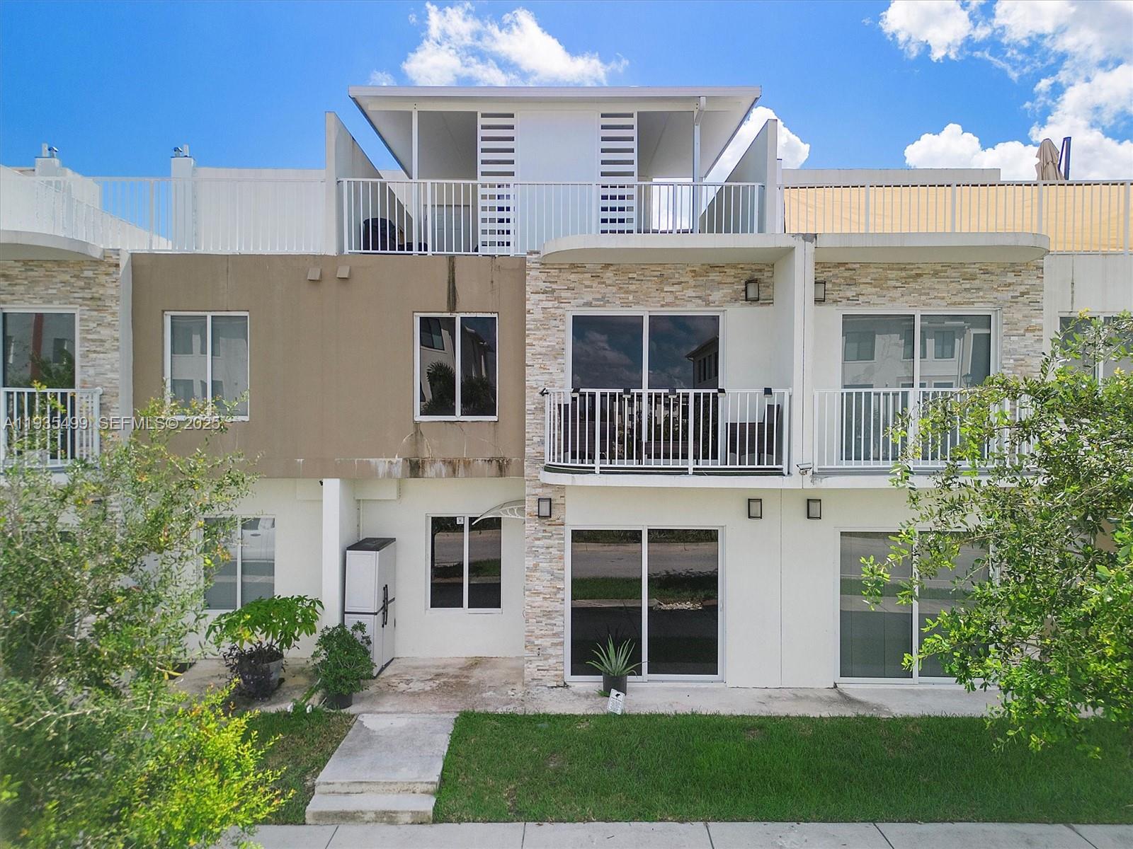 COME BY TO SEE THIS Beautiful 4 bedroom 3 baths and ROOF TOP access to relax in your brand-new pool. Brand-new Stainless-Steel Appliances, Water softening system, Purification drinking system, Quartz countertops, Wood Cabinets, tankless water heater! Near to the Turnpike and Florida Keys. Amazing opportunity for investors. Plenty of guest parking and beautiful common play area! Near Black Point Marinas, Zoo, Everglades, Homestead Miami Speedway, Museums, and many attractions. Home is currently being Airbnb and has downstair bedroom rented with tenant willing to stay, incoming producing. Property is fully furnished.