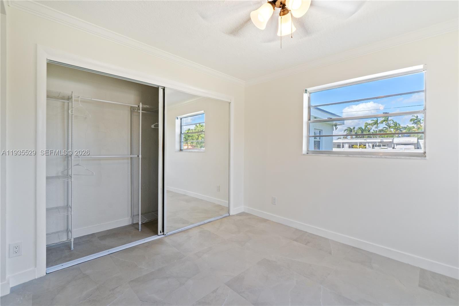 Open-concept living area at 232 6th St - Home in Dania Beach