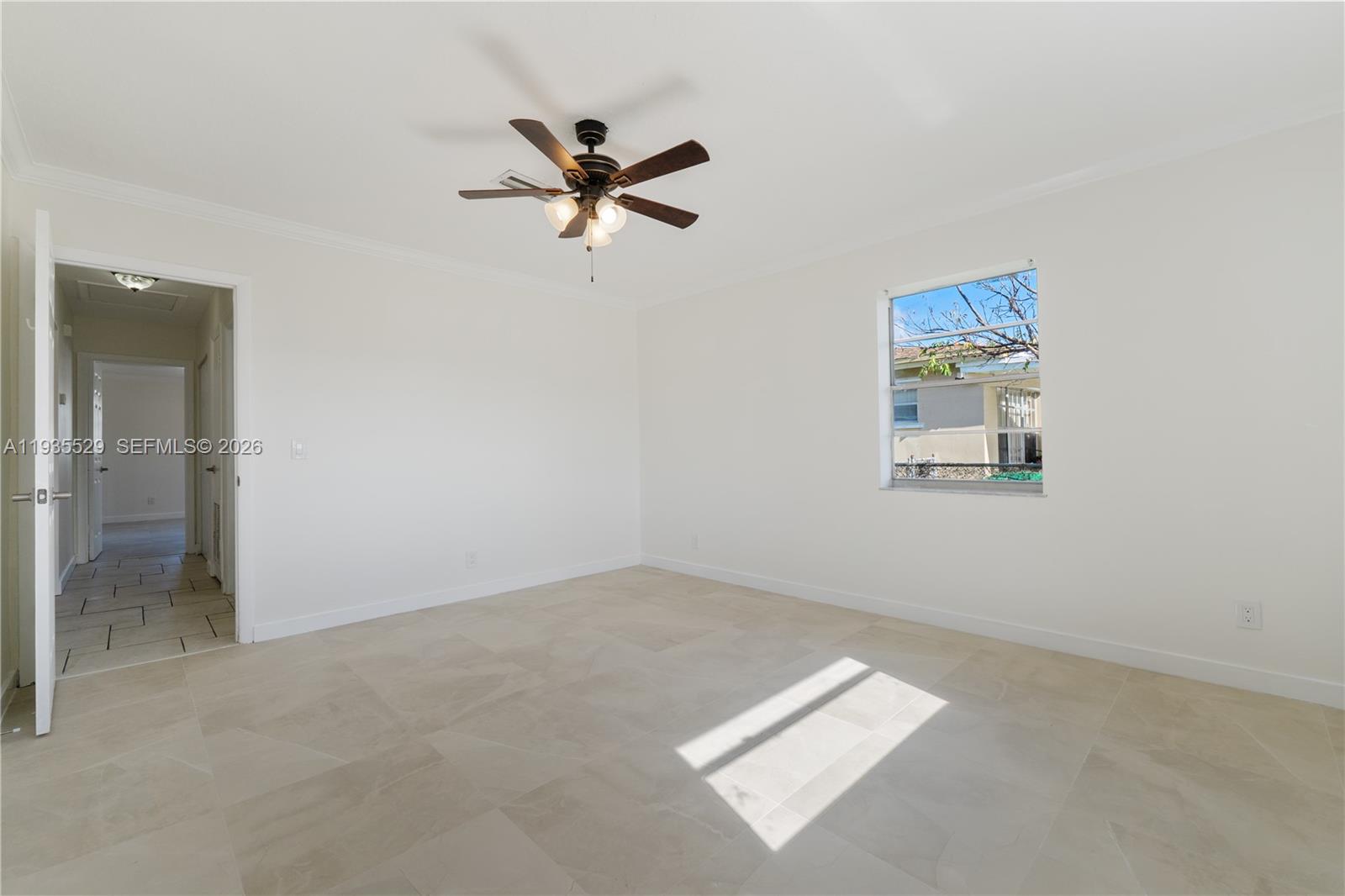Modern kitchen with designer features at 232 6th St - Home in Dania Beach