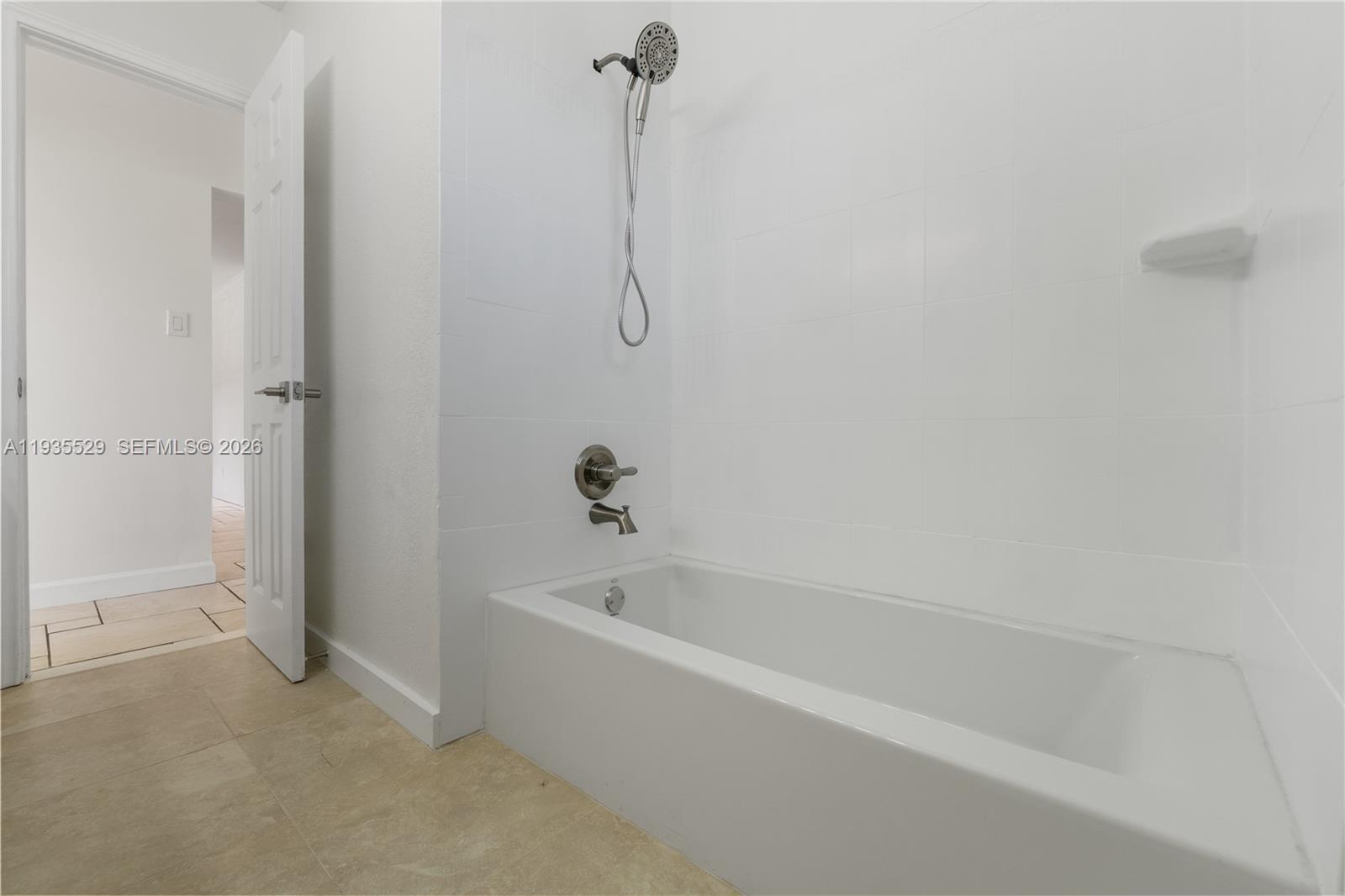 Open-concept living area at 232 6th St - Home in Dania Beach