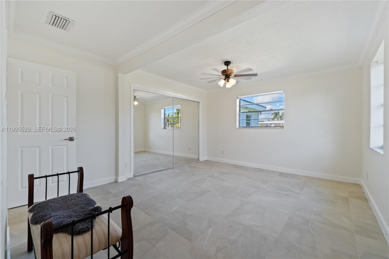 Well-appointed guest bedroom at 232 6th St - Home in Dania Beach
