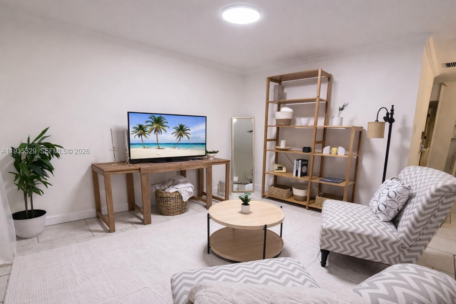 Well-appointed guest bedroom at 232 6th St - Home in Dania Beach