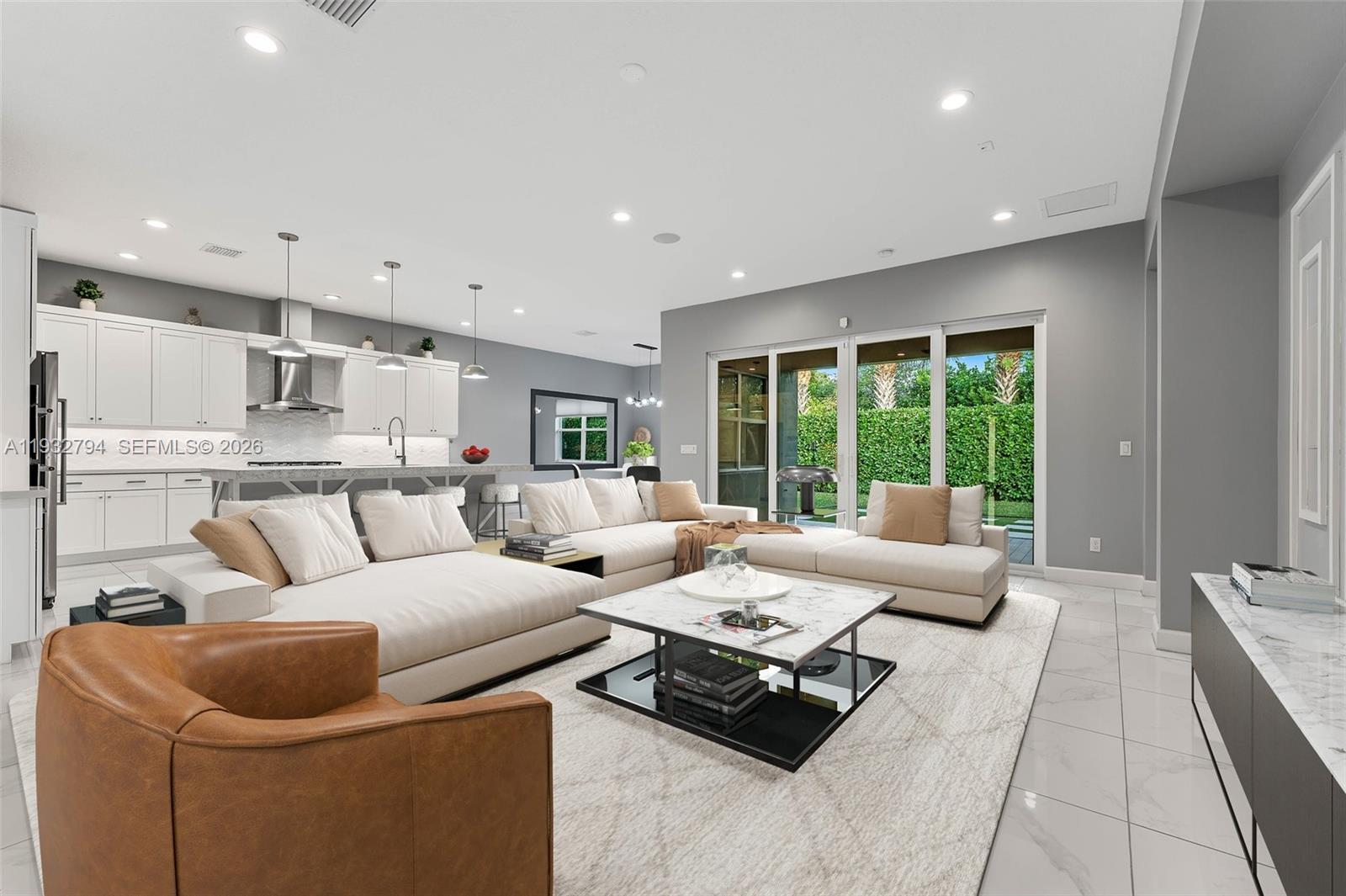 Well-maintained single-story home located in the desirable Andalucia community of Lake Worth Beach.  Built in 2018, the home features impact windows and doors, an eat-in kitchen,stainless steel appliances, formal dining area, family room, and multiple flexible spaces including a den or office. This residence offers a functional layout with spacious living areas, a 2-car attached garage, and a private outdoor kitchen / entertainment area ideal for everyday enjoyment. The community provides excellent amenities such as a clubhouse, community pool, and paved walking areas, with lawn care and common areas maintained by the association. Conveniently located near schools, shopping, dining, and major roadways.