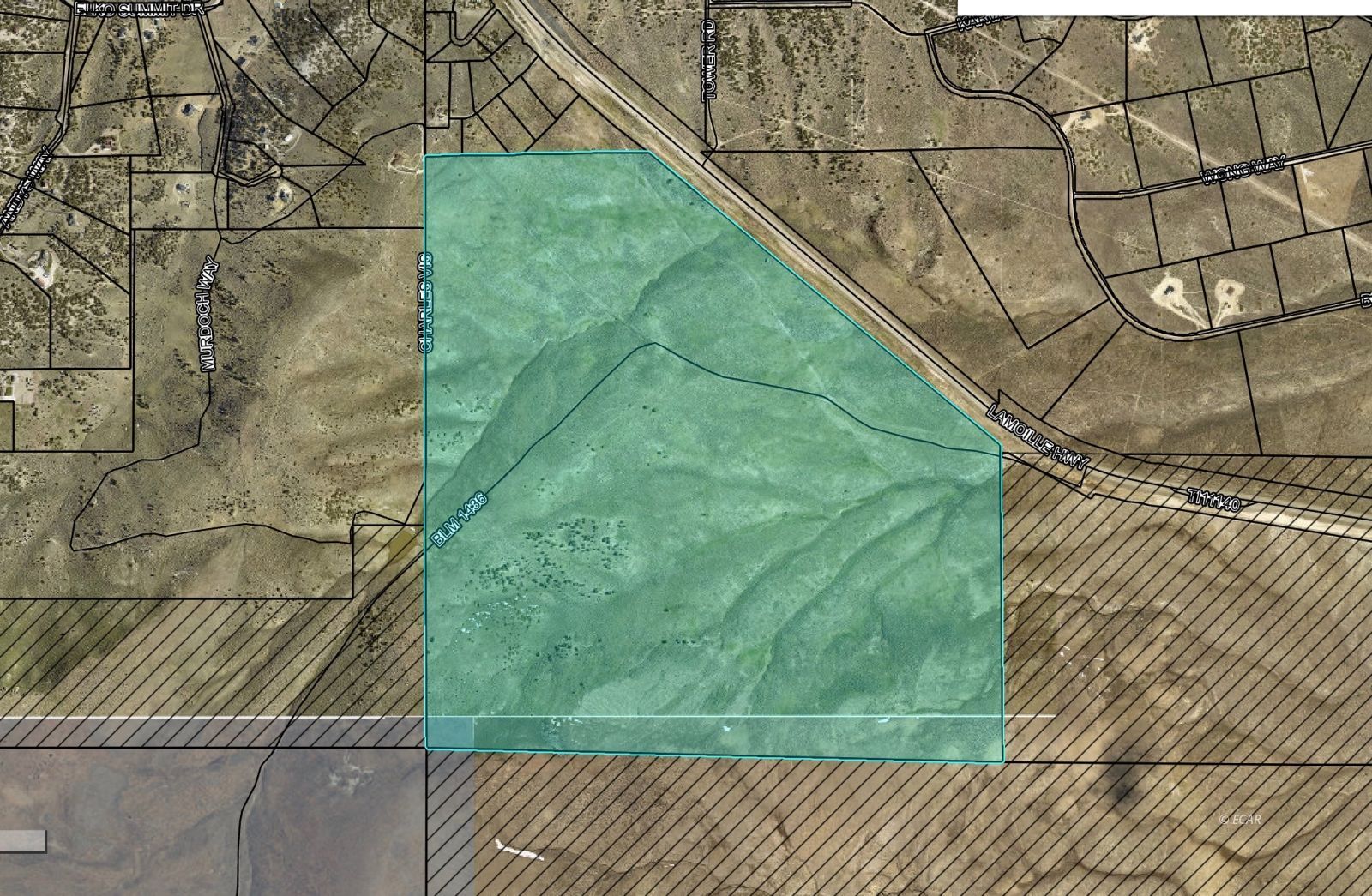 Aerial parcel map with a large tract highlighted beside Lamoille Highway.