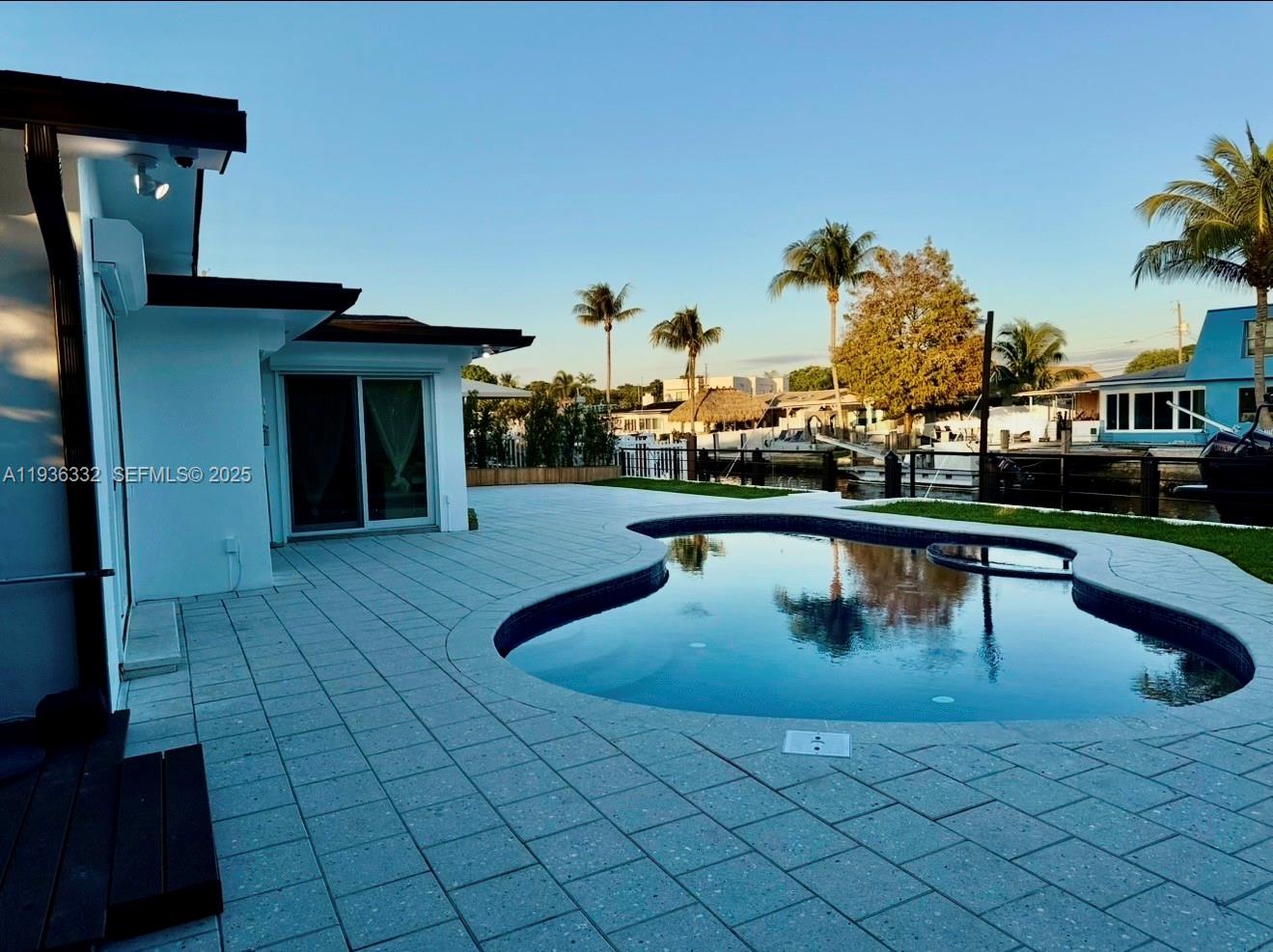 Spacious living room with panoramic views at 806 Argonaut Is - Home in Dania Beach
