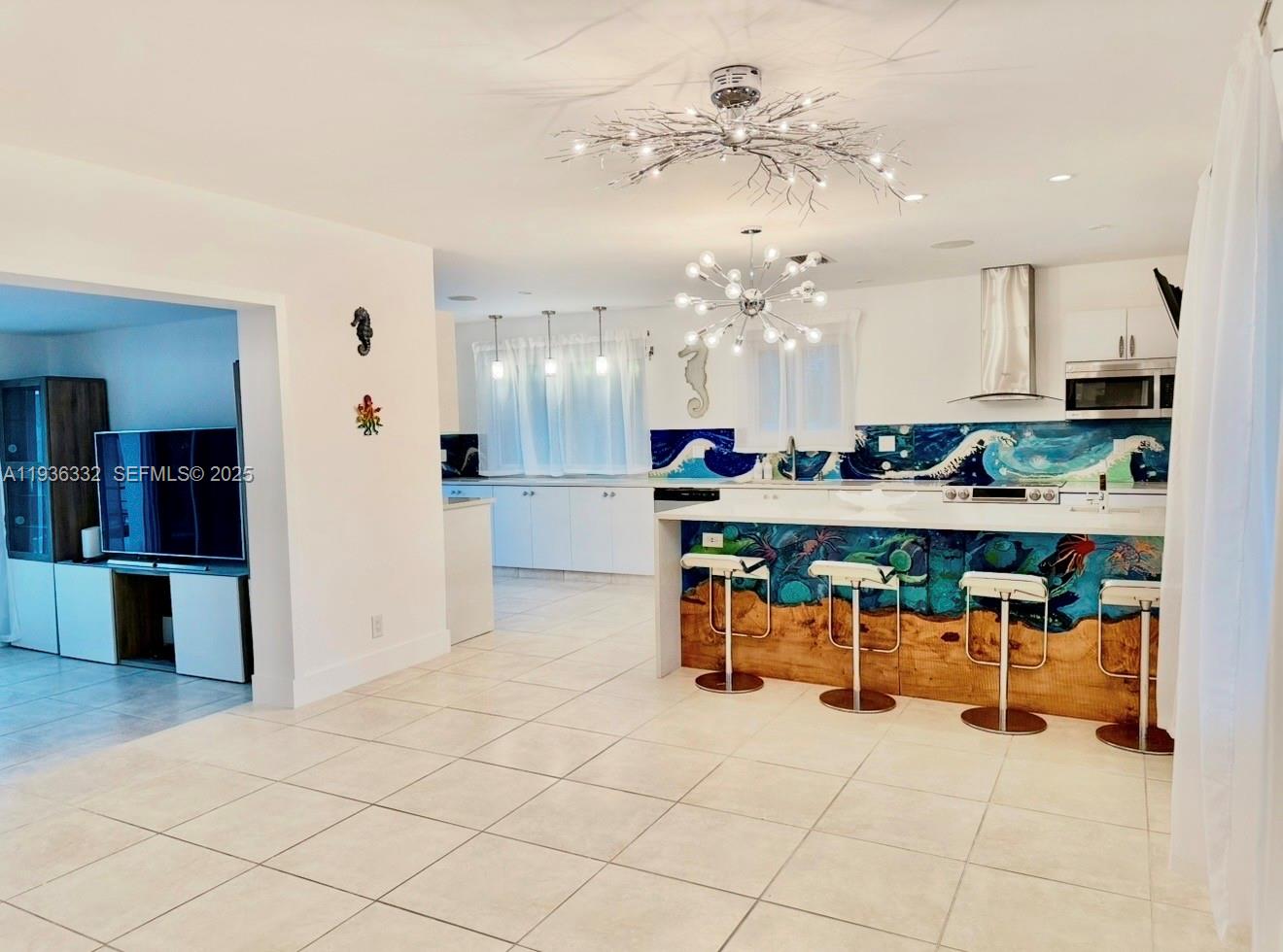 Modern kitchen with designer features at 806 Argonaut Is - Home in Dania Beach