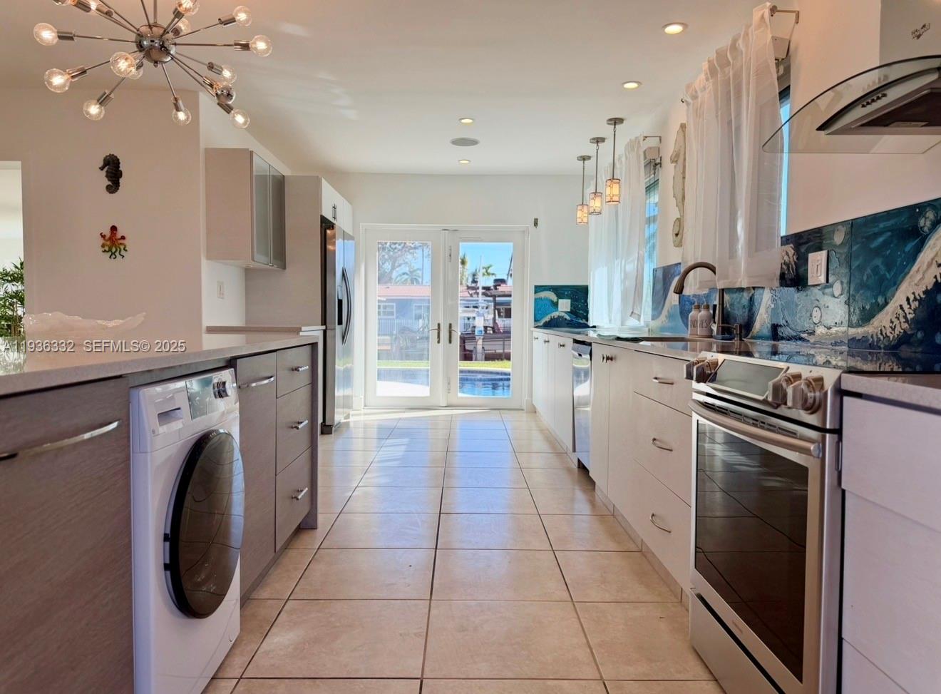 Resort-style pool and outdoor entertaining at 806 Argonaut Is - Home in Dania Beach