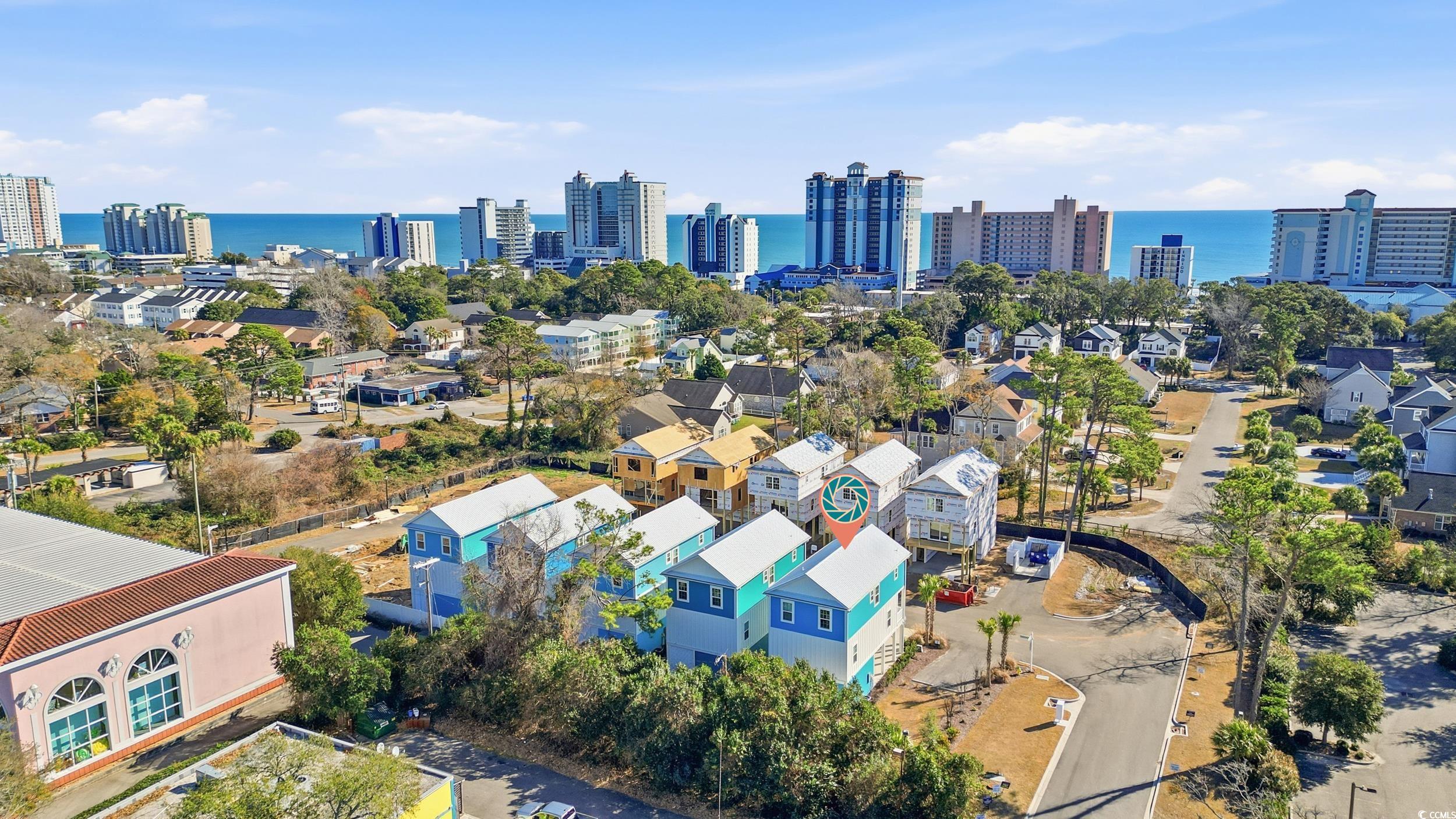 Aerial view of skyline and a nearby body of water