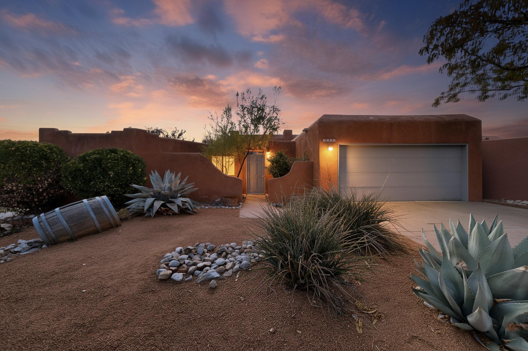 Experience North Valley charm in desirable Thomas Village Patio Home neighborhood. This inviting 3-bed, 2-bath home is located on a prime corner lot w BY access to community park. A gated courtyard leads to bright, open-concept great room w French doors, kiva fireplace, high ceilings & near floor-to-ceiling windows overlooking the private, walled yard & patio - perfect for privacy & entertaining. Updated kitchen w lots of storage, skylight & desk w   direct access to utility room & 2-car garage w built-in storage cabinets. The primary suite offers its own patio access, a walk-in shower & walk-in closet w newly installed carpet. Two additional bedrooms & a hall bathroom w walk-in shower provide flexibility for family & guests. Professionally painted, ceiling fans w remotes in each ...