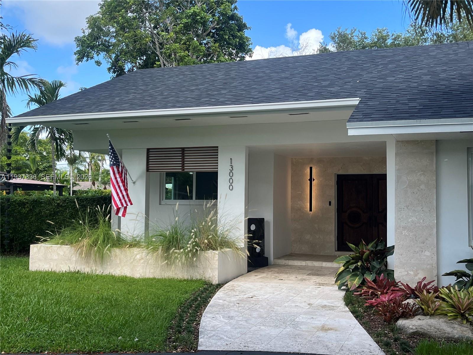 Completely renovated, family house in Pinecrest. "A Turnkey Gem" designer remodeled with 5 bedrooms, 4 full baths over 3000 SF living area located on coveted Palmetto Island. Super quiet street. Close to schools. Fully updated with the latest, modern finishes. Amazing new kitchen with open floor plan and pool view. New roof, new plumbing, new porcelain floors, brand new appliances and cabinets, all new bathrooms; custom closets, all impact windows and doors; 2 car garage, circular driveway, indoor laundry room, huge pantry, beautiful pool area with BBQ kitchen, outdoor shower and nicely landscaped. Coral rock accents give it great curb appeal. This home needs nothing! Living Area under A/C is 3075 SF; adjusted area 3536 SF per survey. Super easy to show.