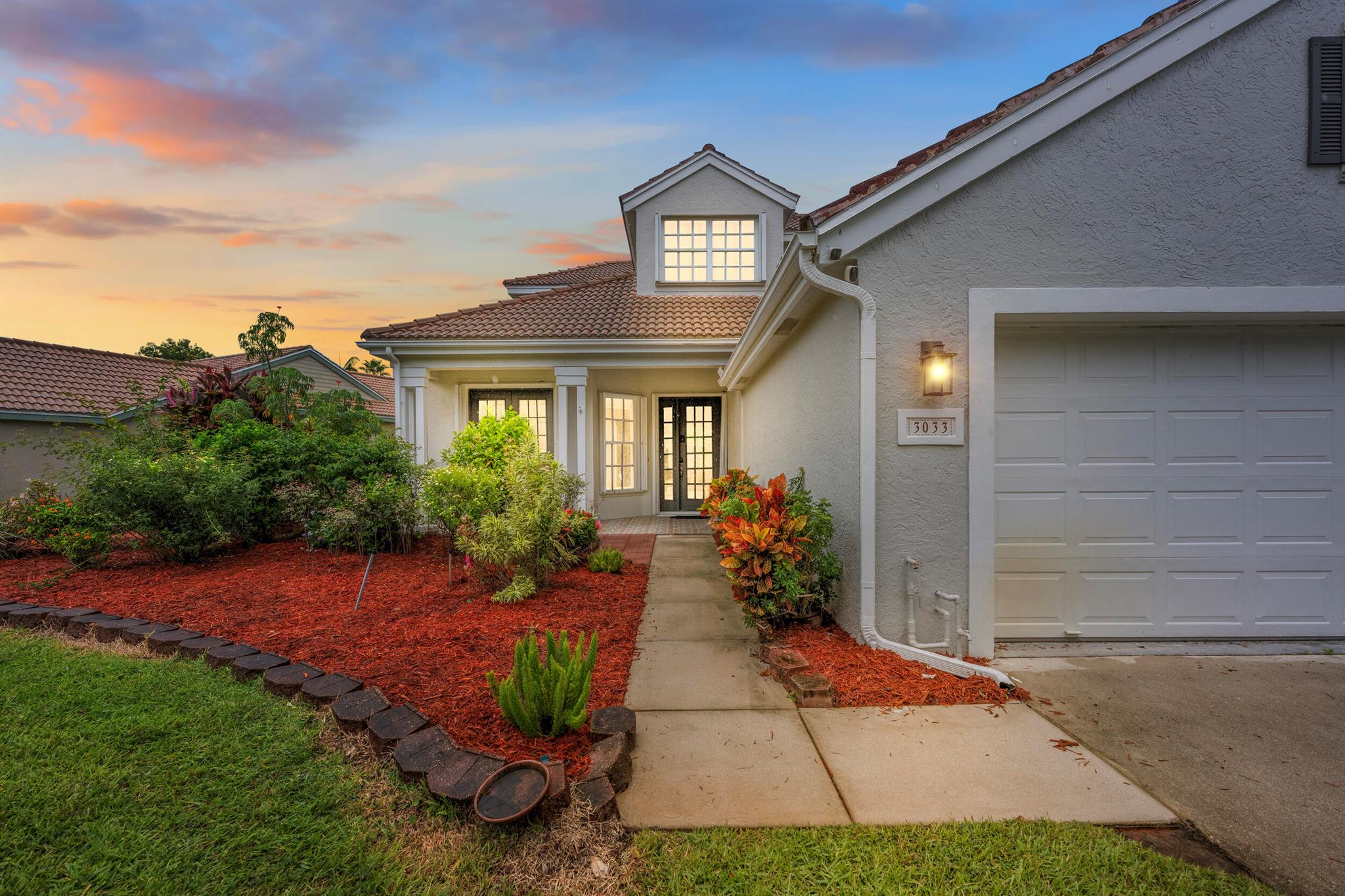 Don't miss your chance to own a 5 bedroom 3.5 bath in the HIGHLY sought after neighborhood: Summerfield! Low HOA fees with luxury amenities: resort style pool, clubhouse, exercise studio, tennis, pickleball, social activities and access to The Champions golf course. This property is equipped with new vinyl flooring throughout, fresh interior paint, and the back patio of your dreams! Additional features include SpeedQueen washer/dryer, 2024 downstairs AC, 2021 water heater, gutters, and FULL storm protection! Primary bedroom with spa like bathroom is tucked away on ground floor. Kitchen is equipped with 2021 stainless appliances, tile backsplash, and granite countertops. Bonus: this home also has a central vacuum for easy cleaning! All security cameras and alarm systems convey!