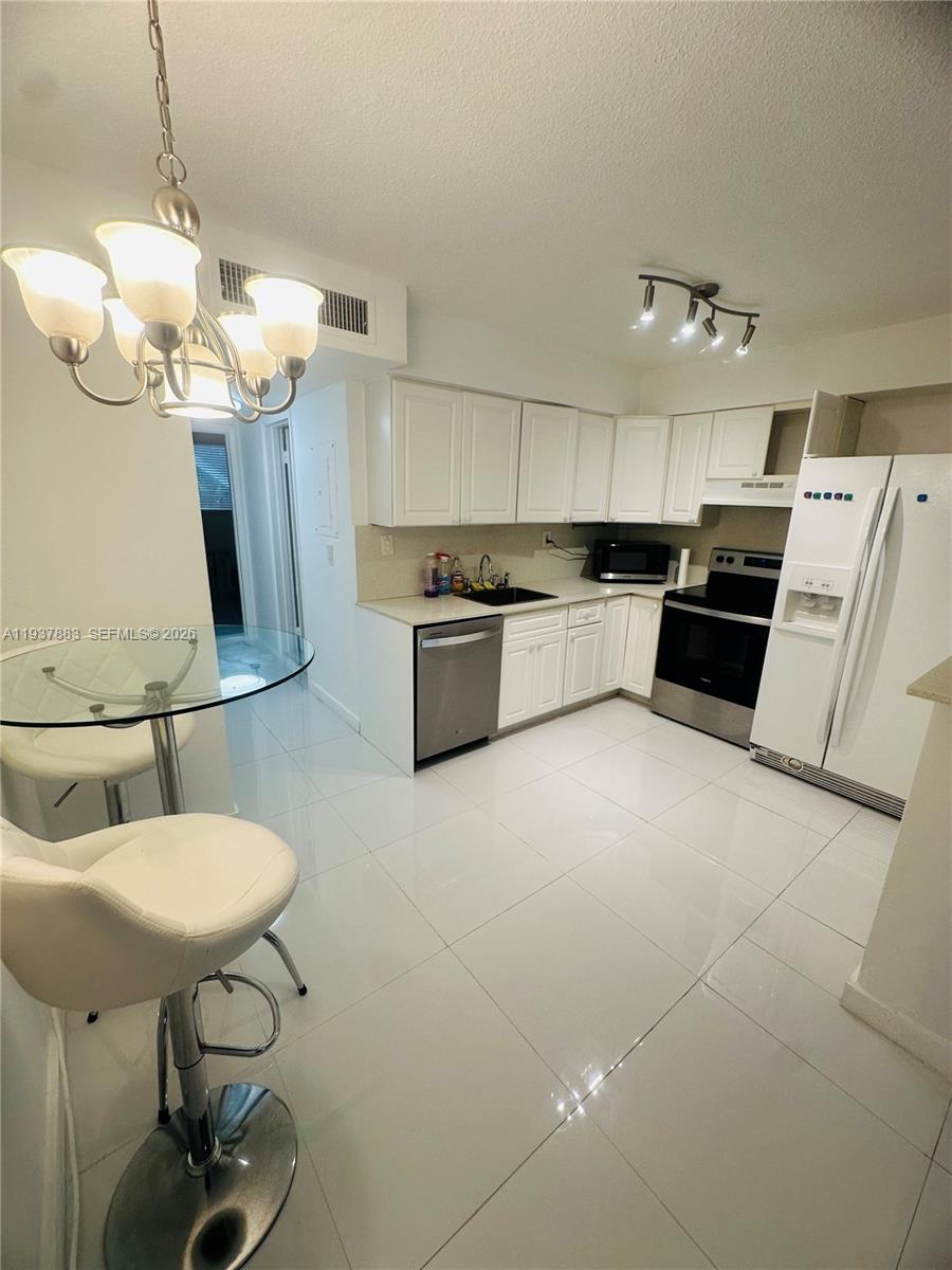 Designer master bathroom at 1120 102nd St - Condo in Bay Harbor Islands