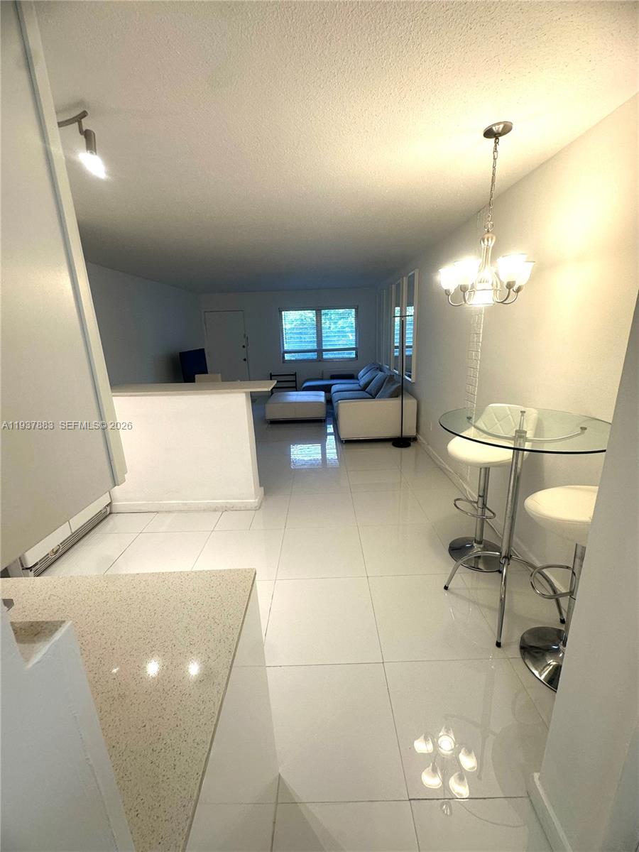 Well-appointed guest bedroom at 1120 102nd St - Condo in Bay Harbor Islands