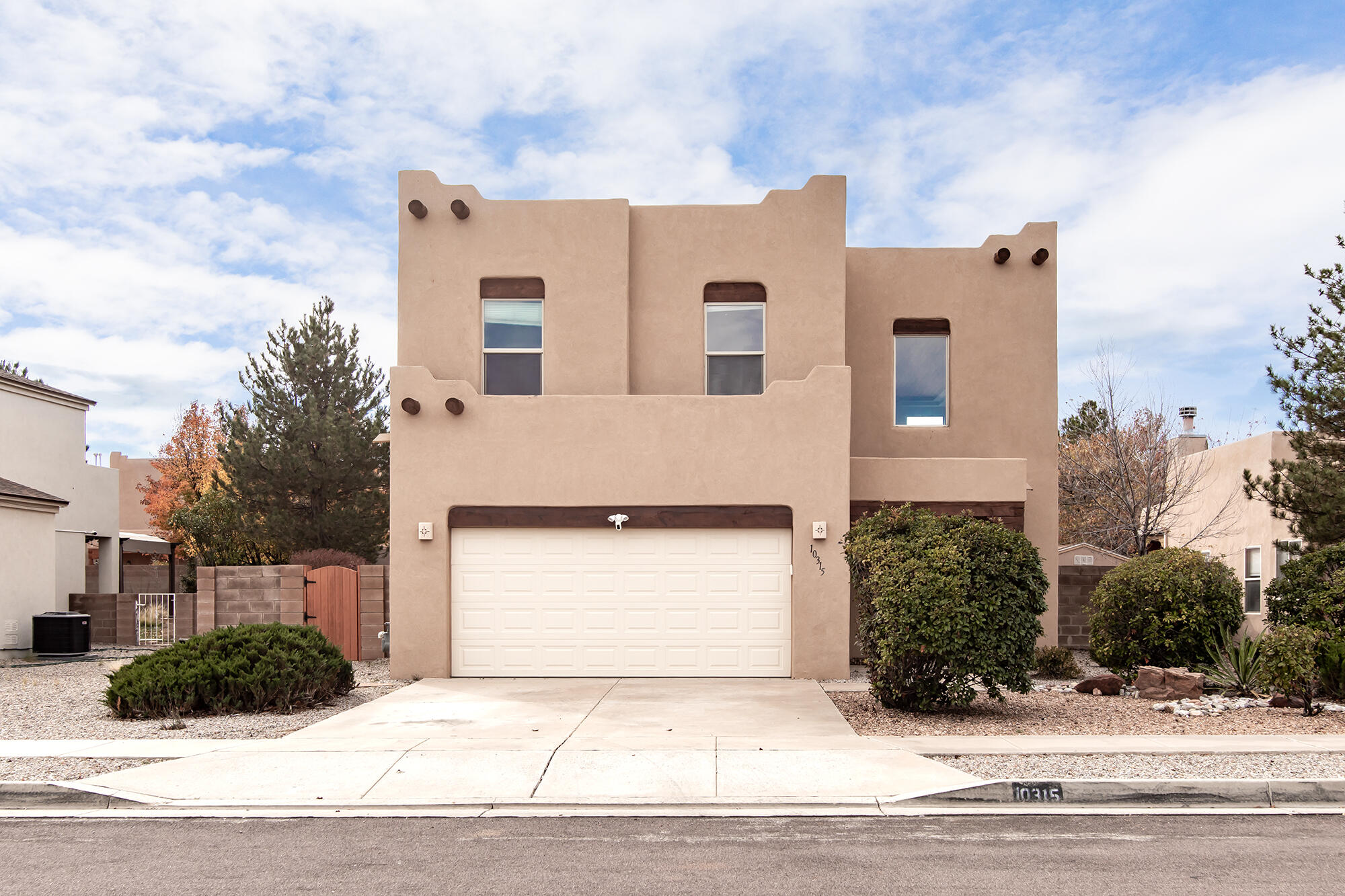 Welcome to this light and bright Raylee home in the desirable Terrazas Subdivision on Albuquerque's westside. Designed for everyday living and entertaining, the home features a professionally built sunroom with a newly installed mini-split system providing both heating and cooling, along with a large covered patio for year-round enjoyment. The flexible floor plan includes three good-sized bedrooms plus a loft ideal for a second living area, study, or media space. The spacious primary suite offers a jetted tub and separate shower. Additional highlights include a formal dining room, freshly painted interior, generous backyard with full landscaping and a putting green, an 8x14 Tuff Shed with electricity, and a quiet cul-de-sac location near a large green park.