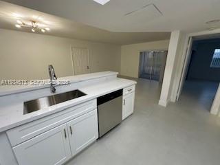 Beautifully & completely romodeled, with a great lake view from your balcony, ideally situated, secured and well-maintained gated community. modern finishes throughout, including a renovated kitchen with stainless steel appliances, granite countertops, and wood cabinetry. The open-concept living and dining area flows seamlessly to a private balcony perfect for relaxing or enjoying your morning coffee. There is a washer and dryer inside a private closet in the balcony. Community amenities include, pool, clubhouse, walking paths, and gym! Located close to shopping, dining, Black Point Marina, and the Florida Turnpike.